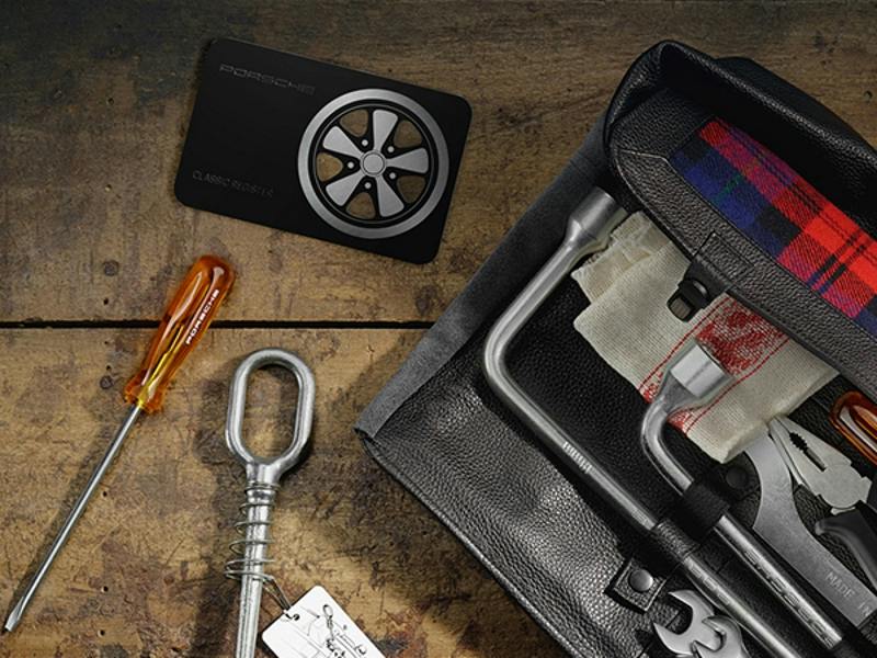 Porsche Classic tool bag lying on the floor.