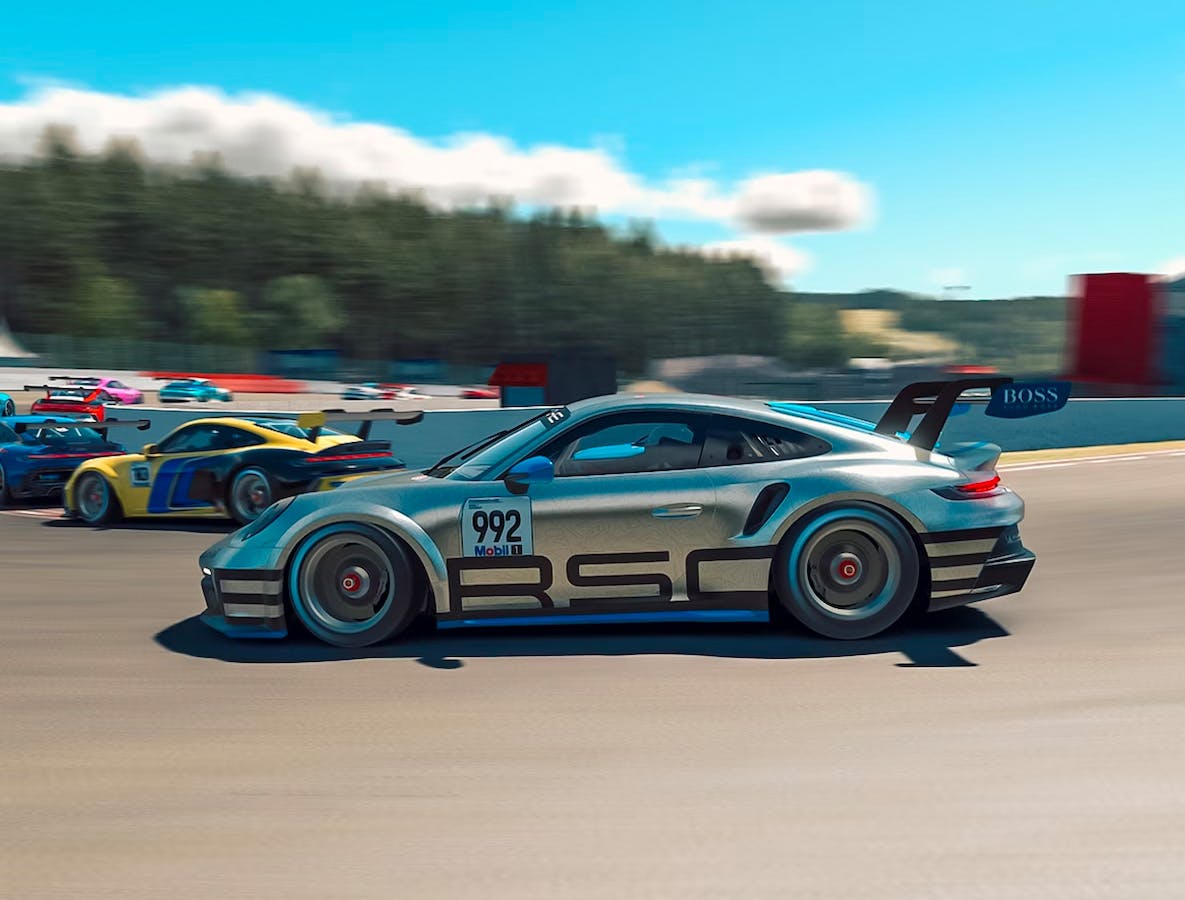 Side view of the Porsche ‘(Type 992)’ 911 GT3 Cup car as it tries to catch up with cars racing ahead.