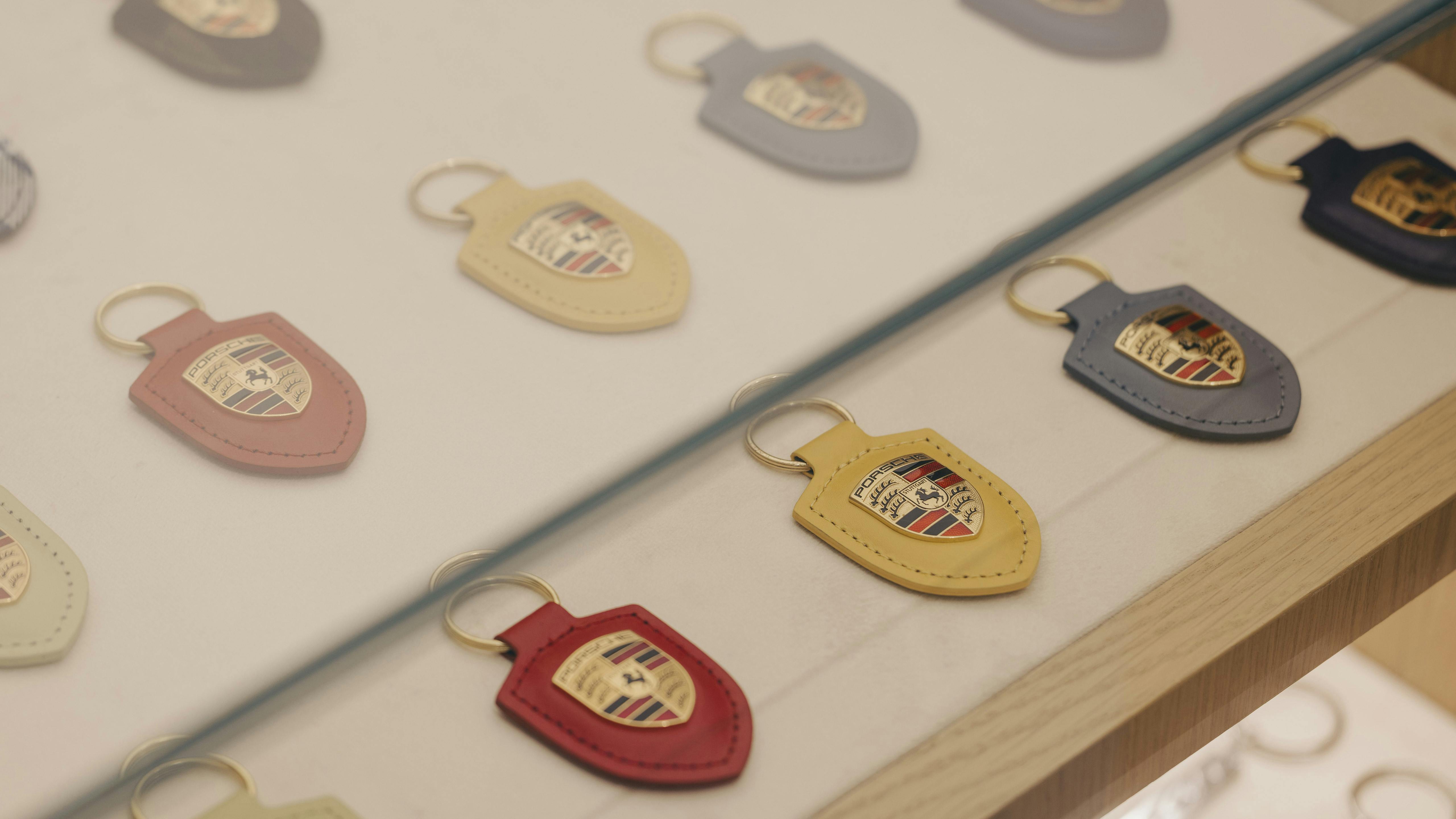 A close up of the various Porsche keyring designs on display