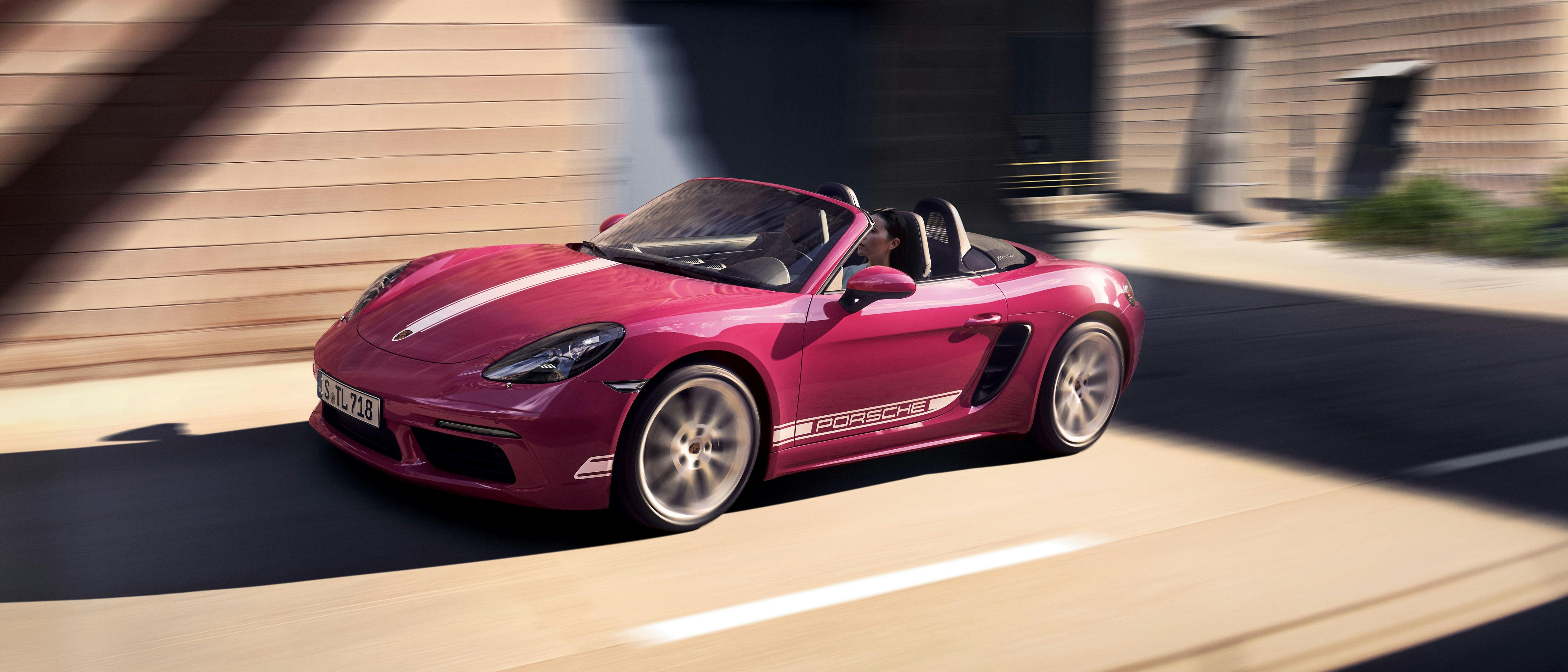 A woman driving the 718 Boxster Style Edition.
