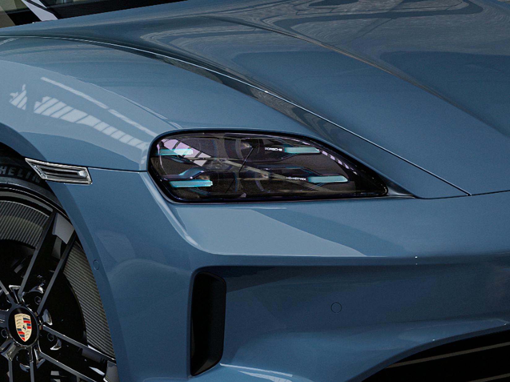 Detailed view of the tinted HD Matrix  LED main headlights on the Porsche Exclusive Manufaktur Taycan GTS.