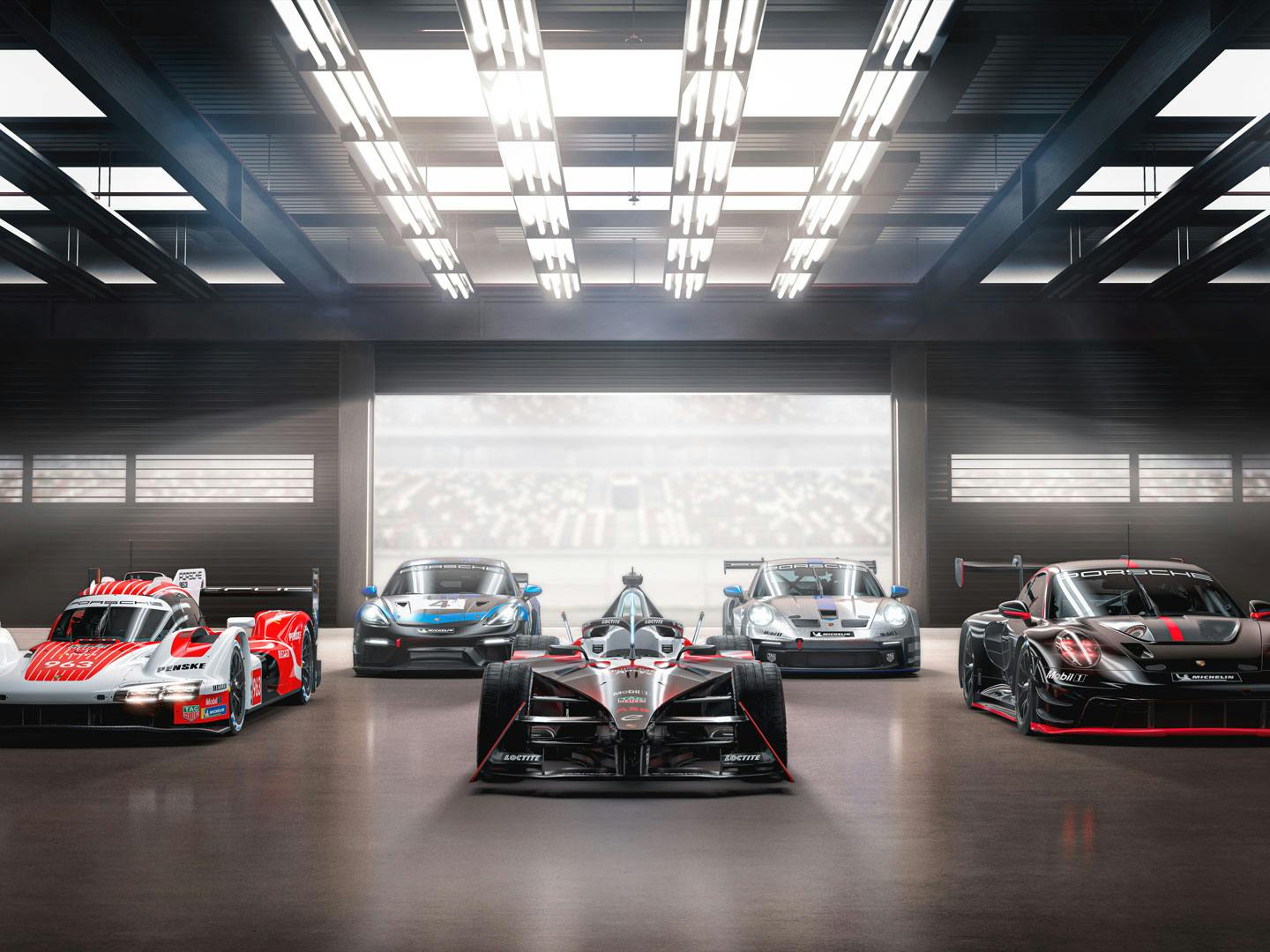 Flera Porsche-sportbilsmodeller som står uppradade i en bilhall.
