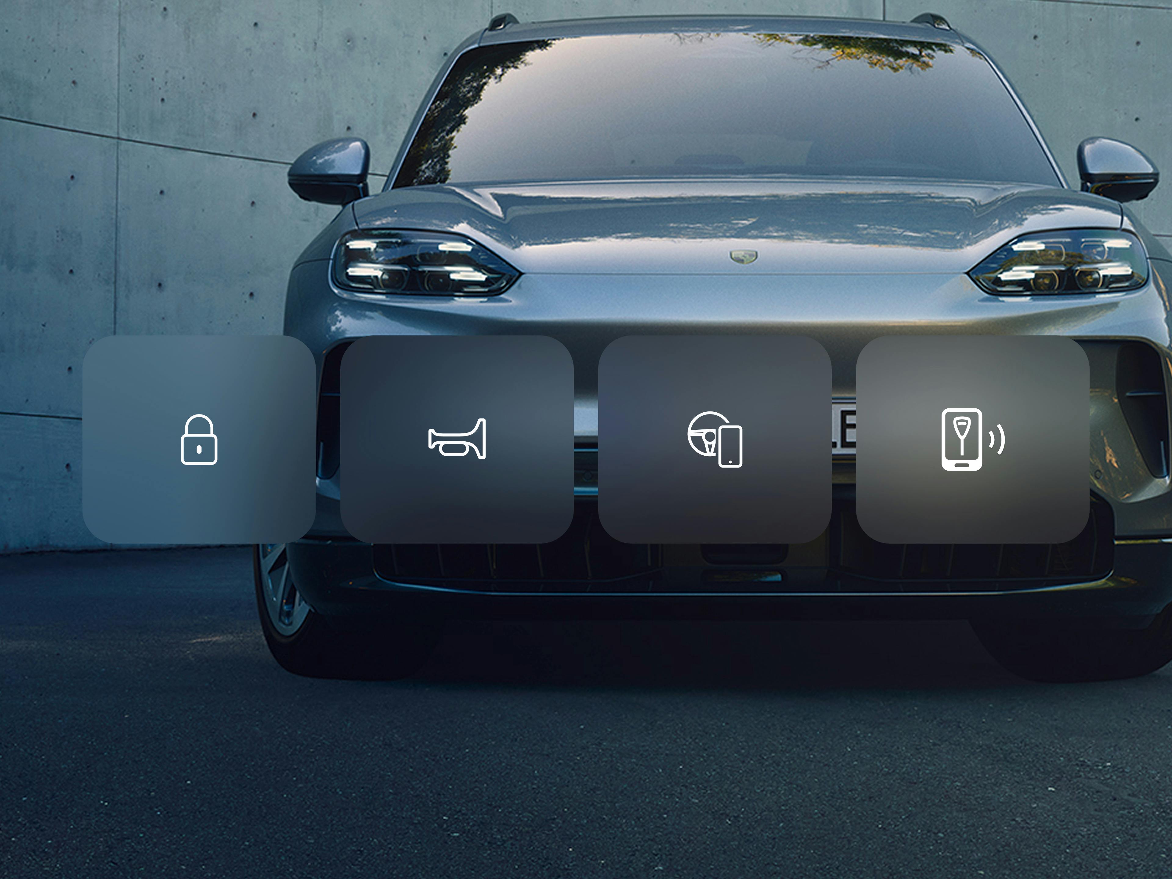 Vista de la aplicación que muestra la parte delantera gris del SUV Porsche, con cuatro iconos de control debajo para las funciones de bloqueo, bocina, climatización y carga.