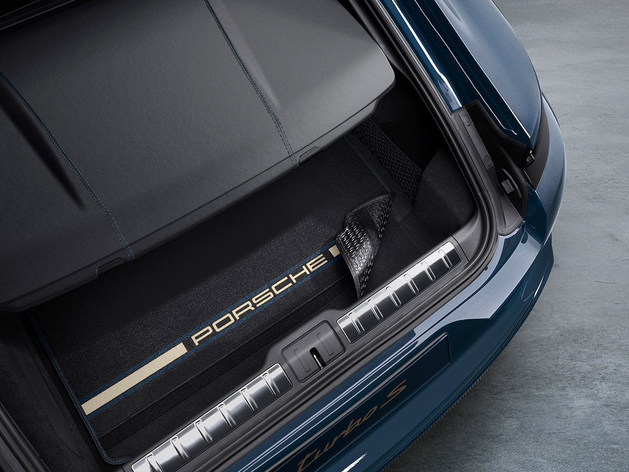 Detailed view of the Porsche Exclusive Manufaktur reversible passenger compartment mat for the Panamera.