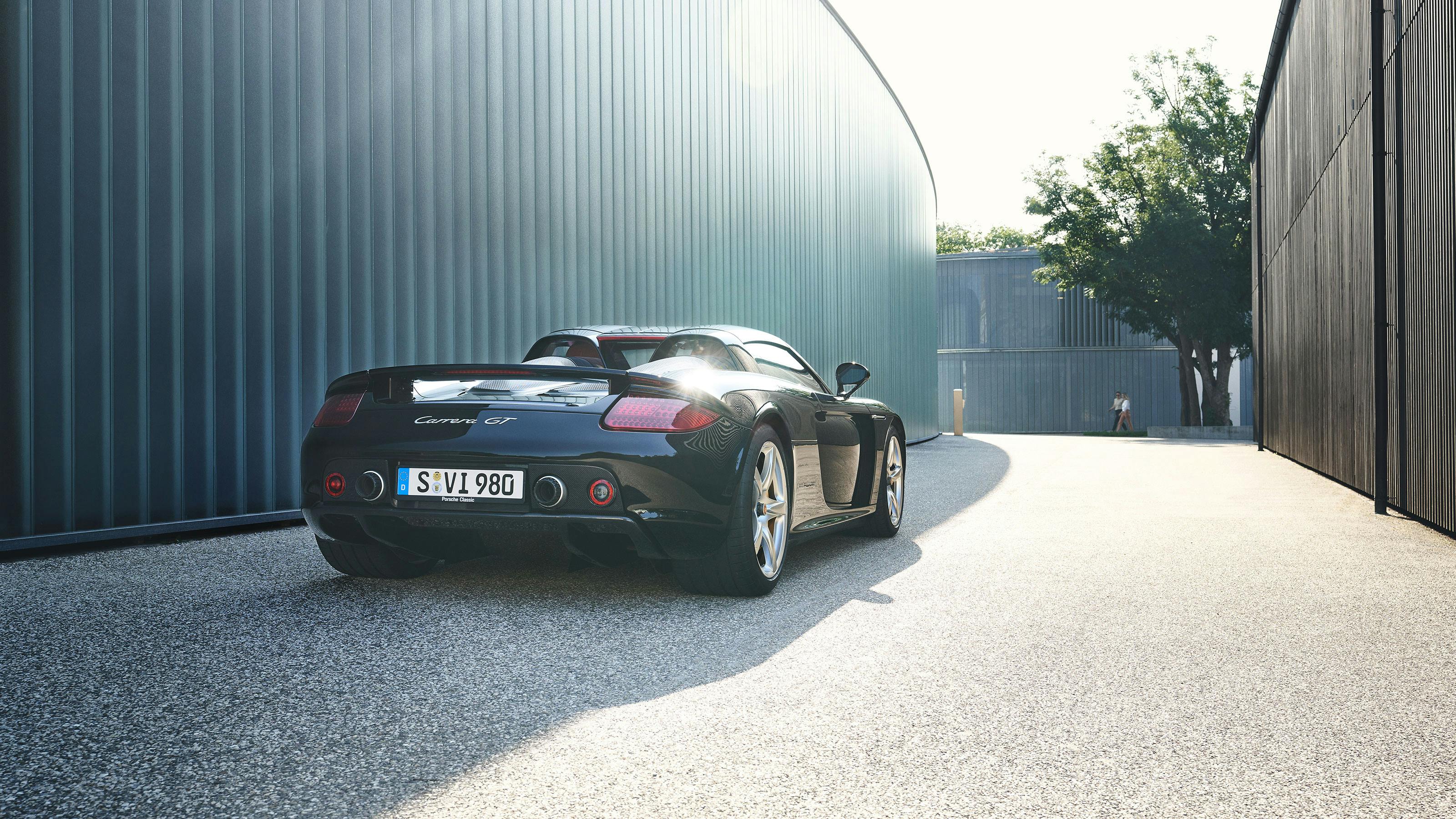 Porsche Carrera GT (Type 980), Black, rear view.