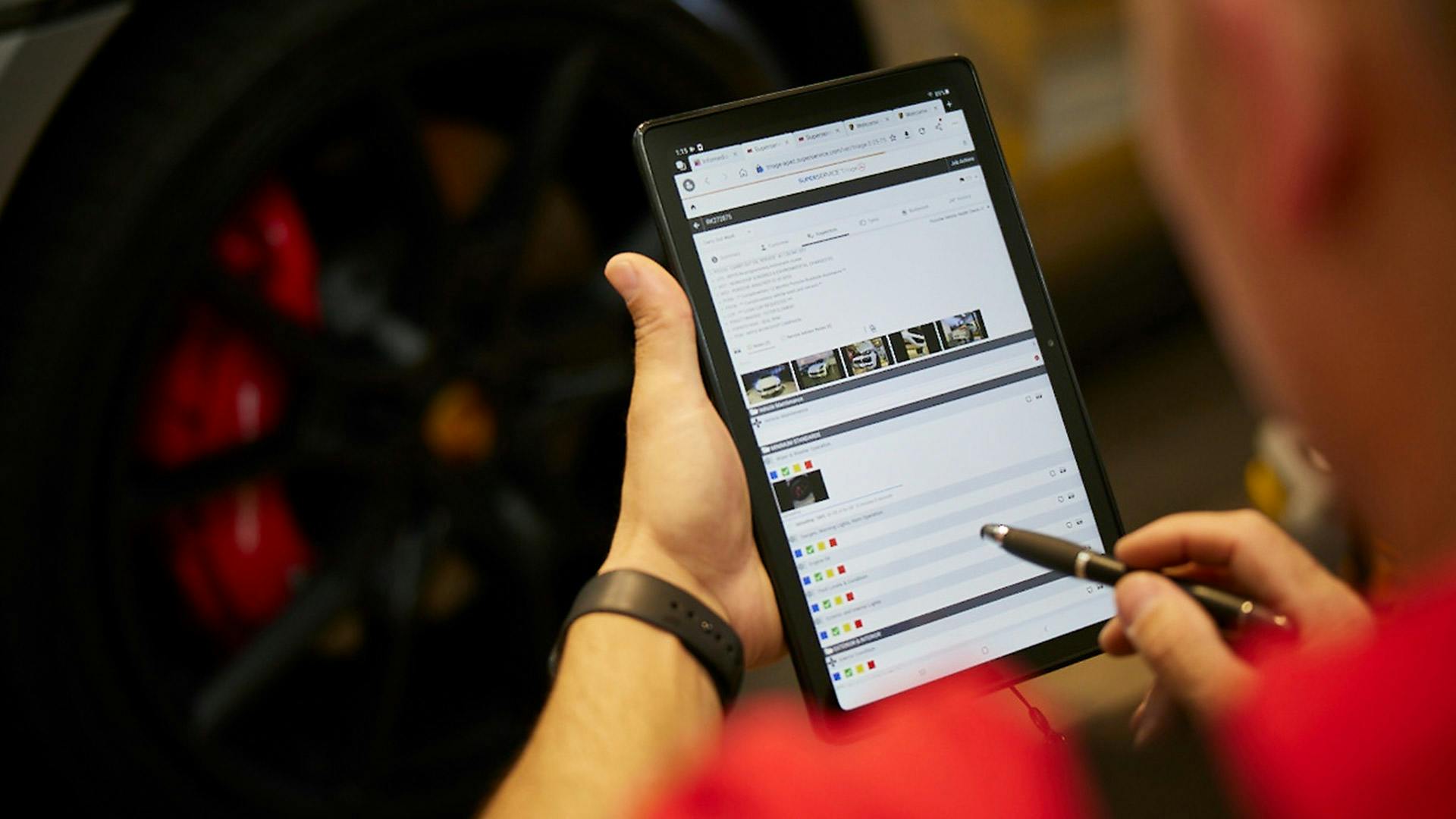 Tablet with servicing checklist open