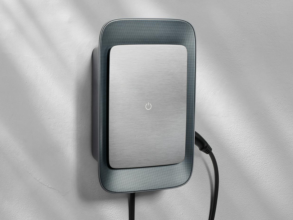 Porsche Wallbox against a grey background.