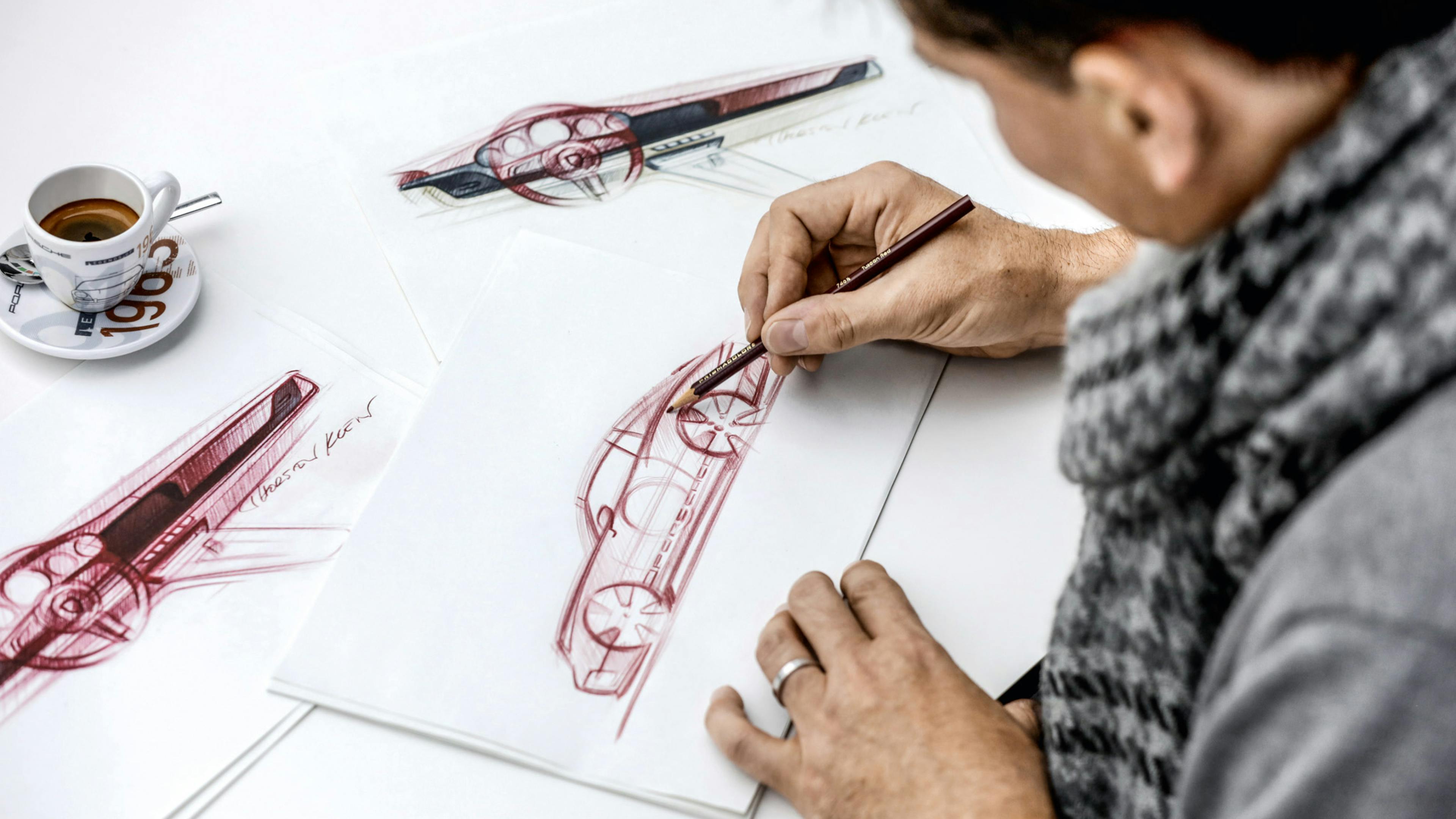 Sketch of a Porsche is being made.