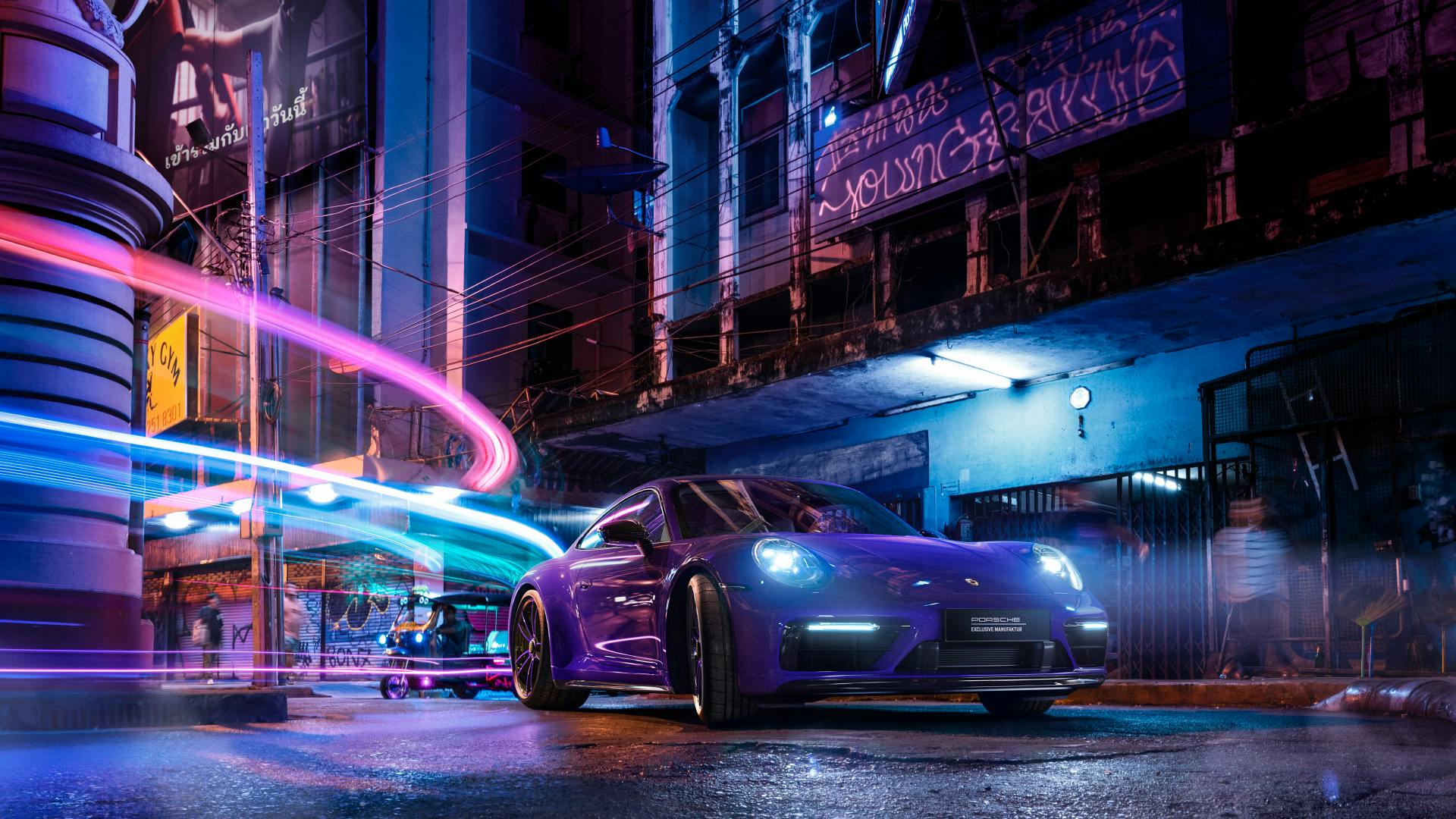 Dreams in Colours: Ultraviolet 911 model drives through Thailands streets at night with neon lights.