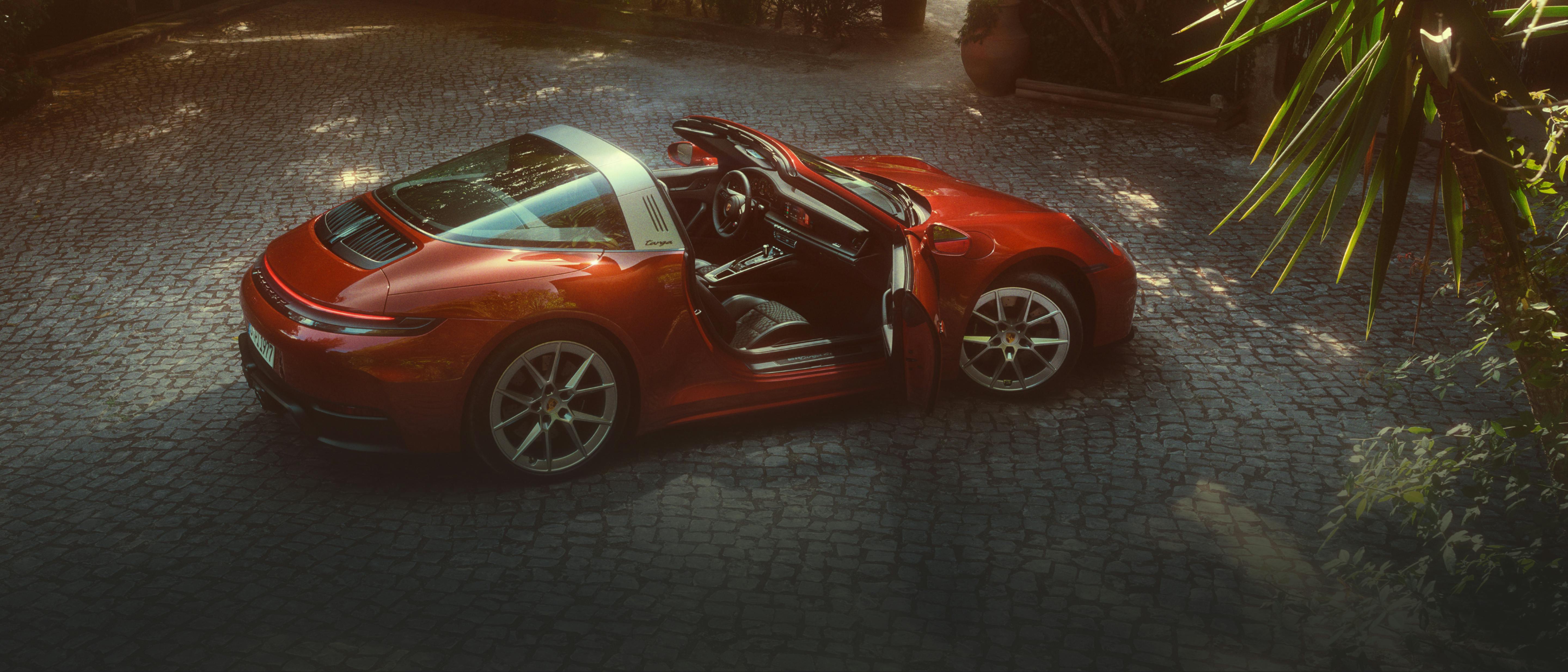 Porsche 911 Targa with Heritage Design Package Pasha. Side view of the vehicle with passenger door open.