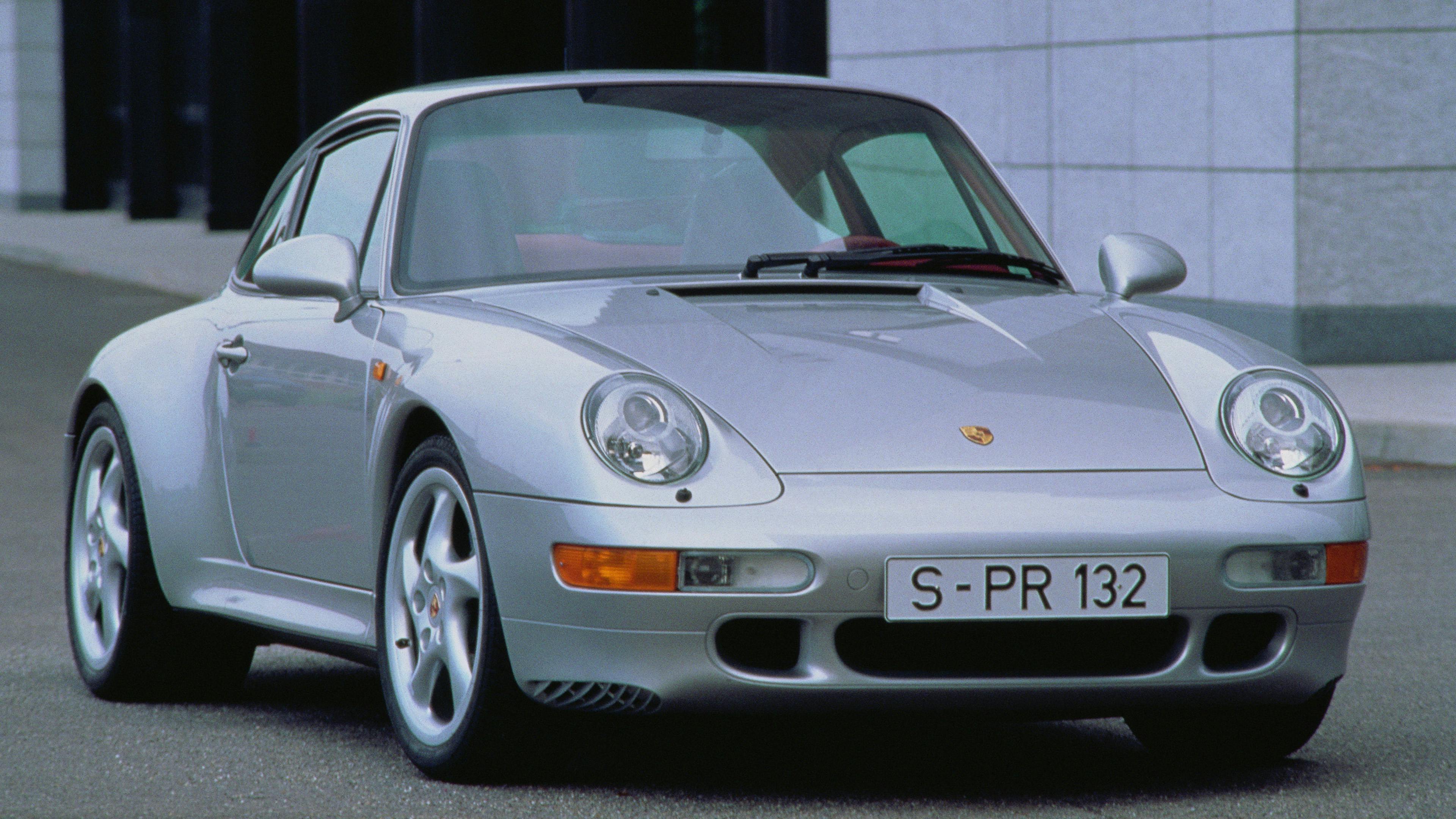 Silver Porsche 911 Carrera 4S (1996-98).