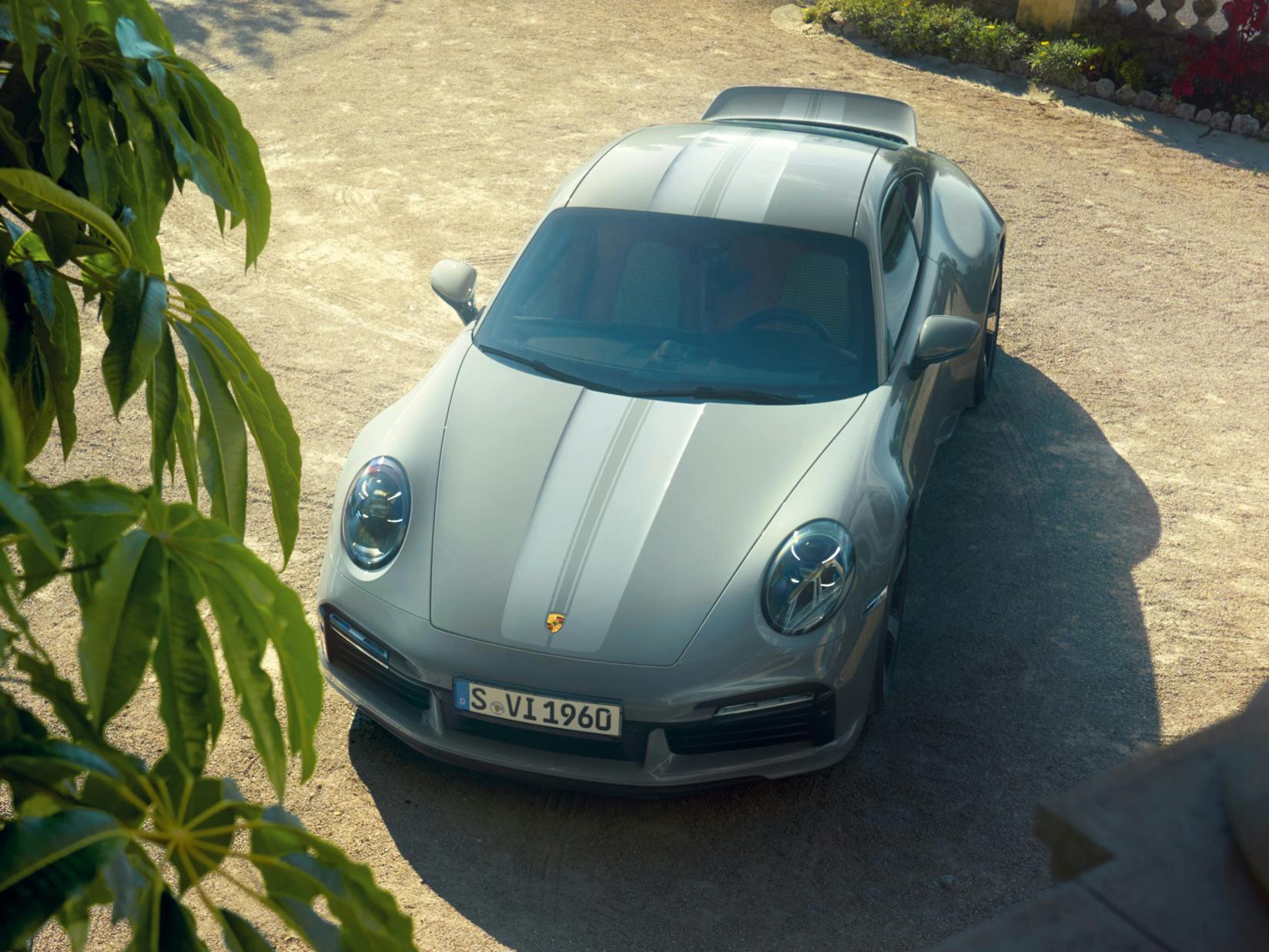 View from the front from an elevated position of the front of the Porsche 911 Sport Classic in Sport Gray Metallic.