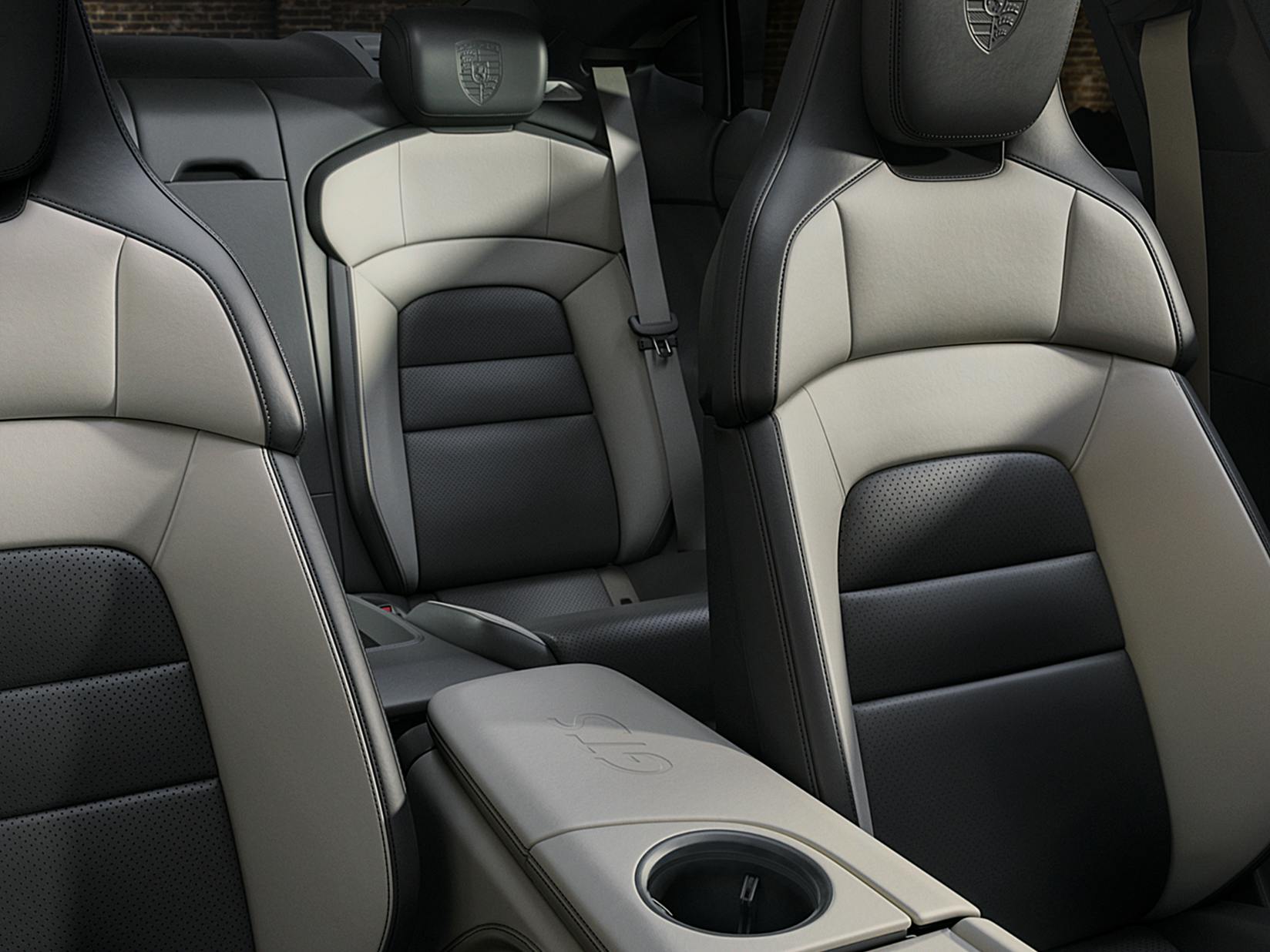 Porsche Exclusive Manufaktur Taycan GTS with matt carbon interior package and accent package. Detailed view of the centre console.