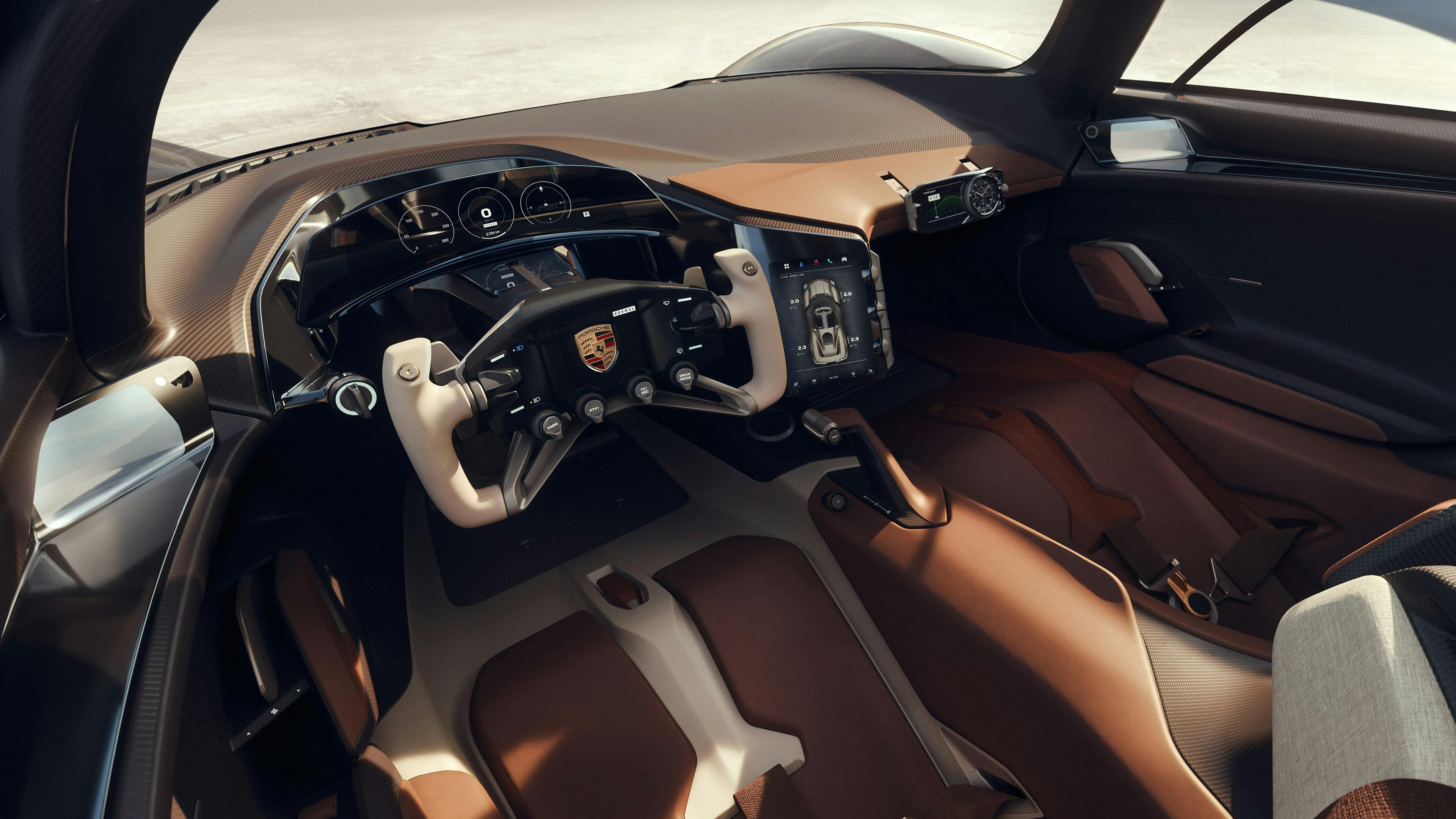 Interni della Porsche Mission X: vista dettagliata dello schermo centrale e del display curvo.