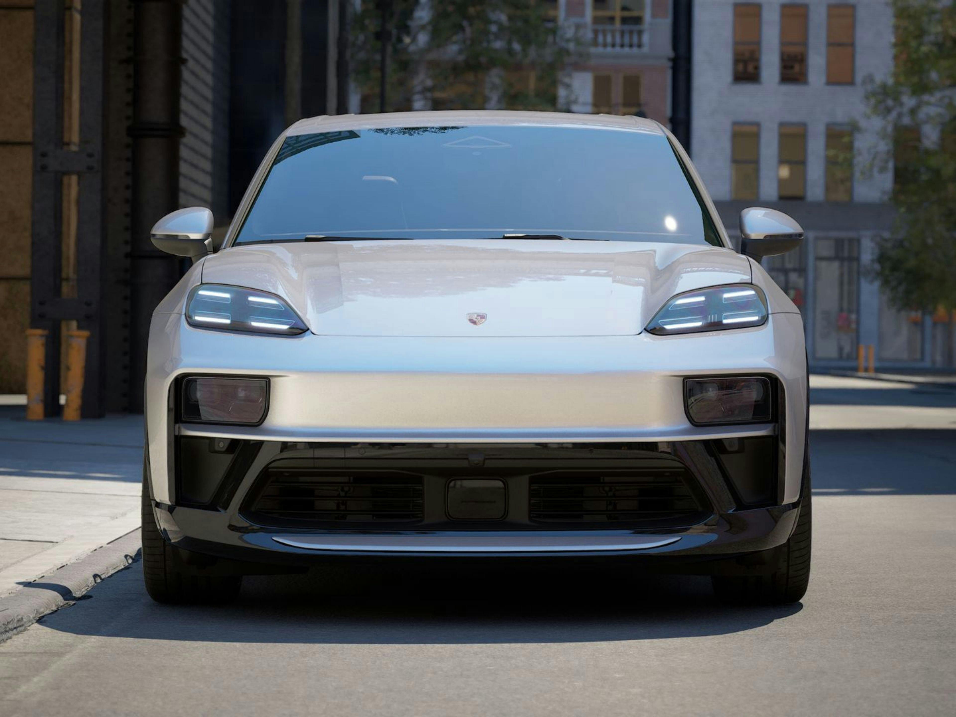 Vista frontale di una Porsche Macan e-motion.