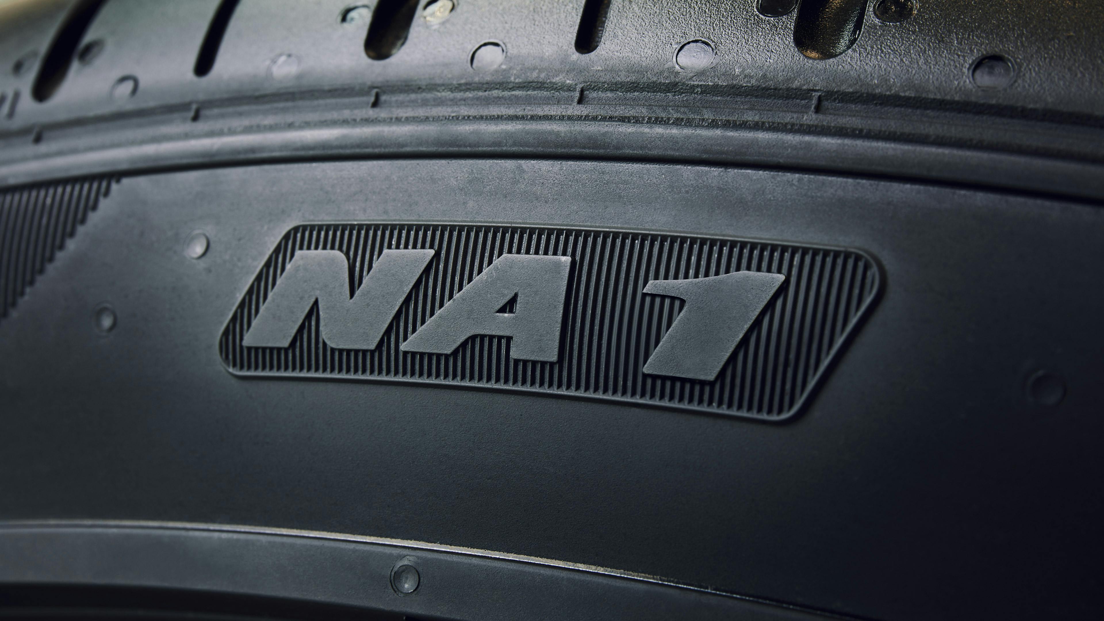 Close-up of a Porsche tyre with the NA 1 marking on the tread