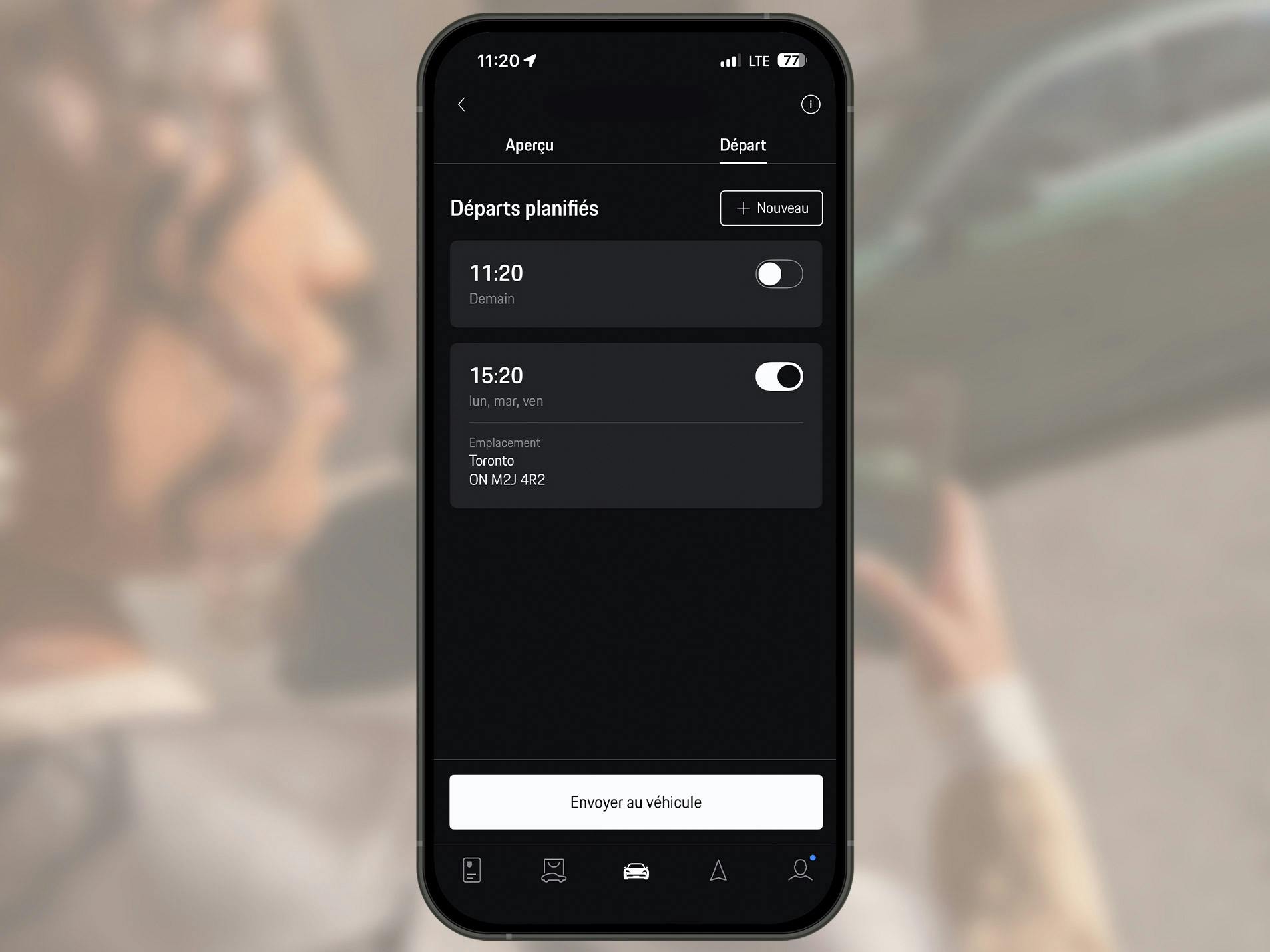 Écran de smartphone montrant la vue du minuteur de charge dans l’application My Porsche.