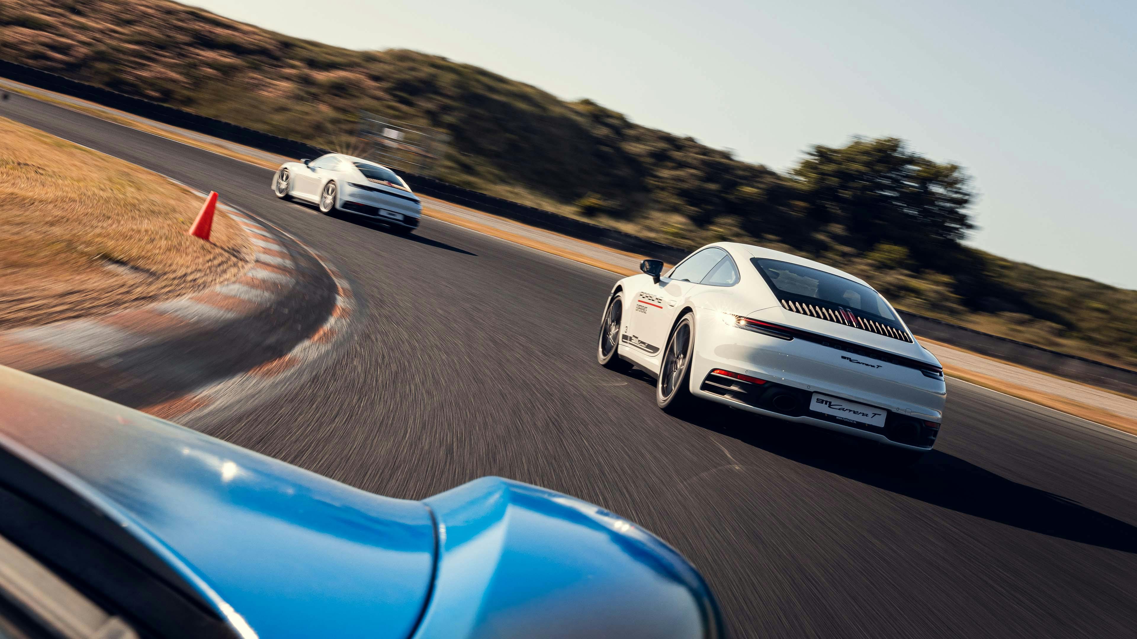 Diverse Porsche rijders op het circuit van Zandvoord tijdens de Porsche Track Experience