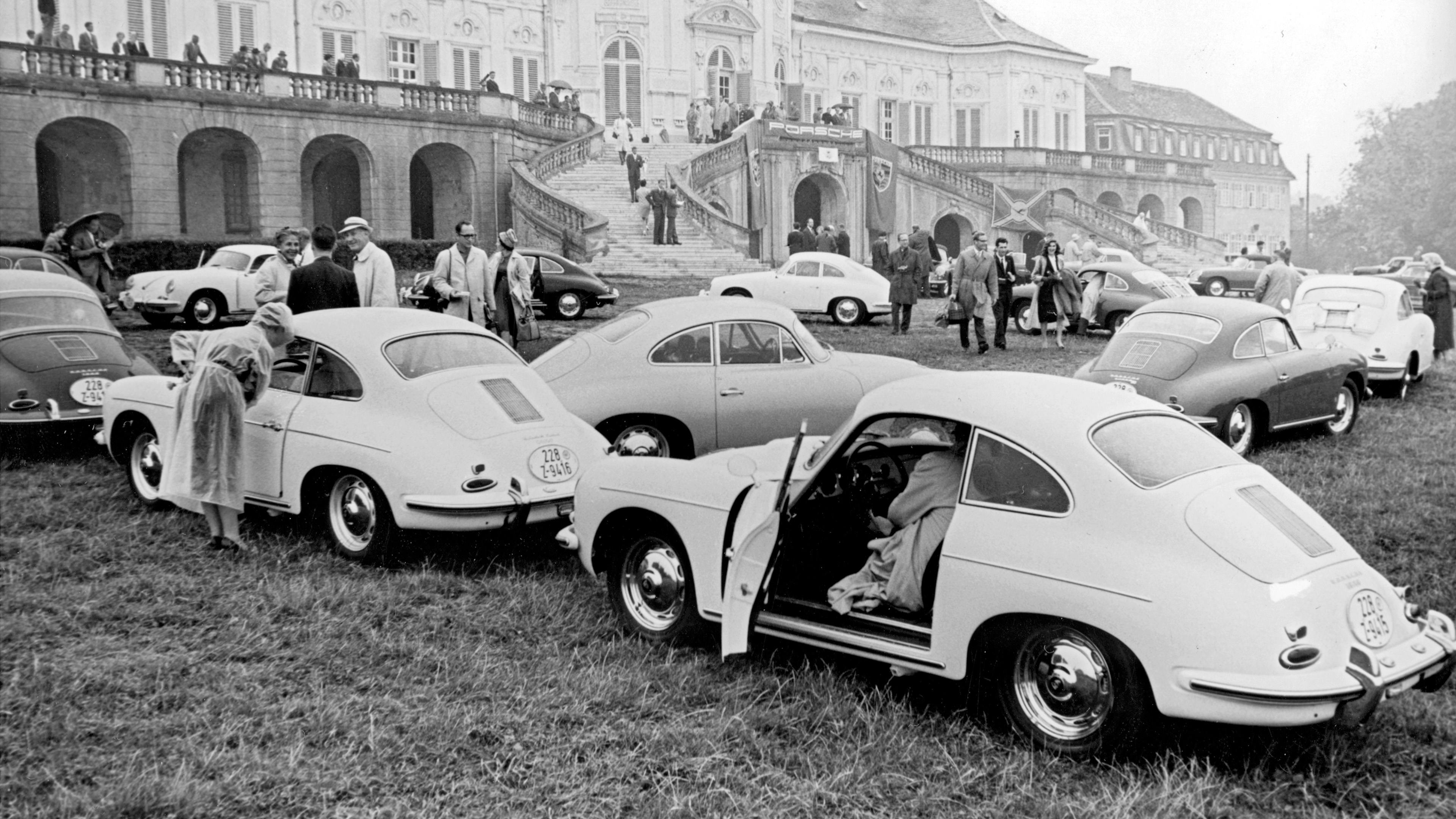 Classic Porsches parked at a meet-up event.