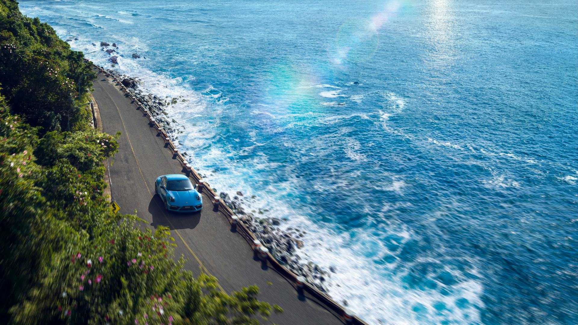 Dreams in Colours: Rivierablue 911 model drives along the beach.