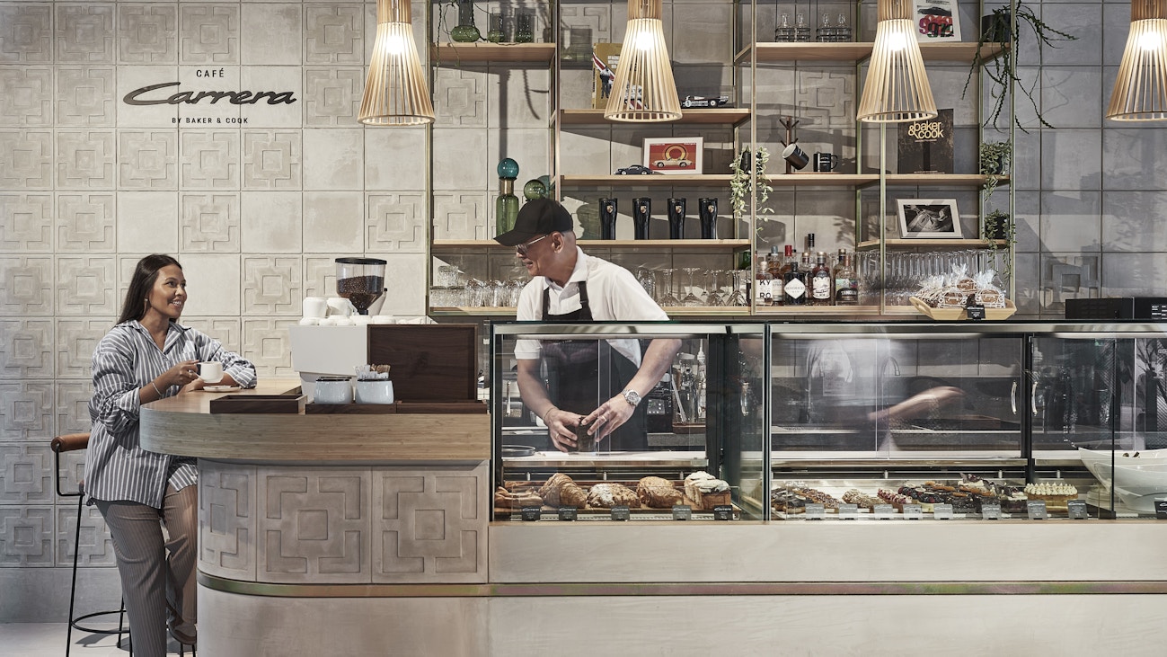 Image 4: Café Carrera by Baker & Cook, a contemporary space for Porsche enthusiasts to share their passion with like-minded dreamers.