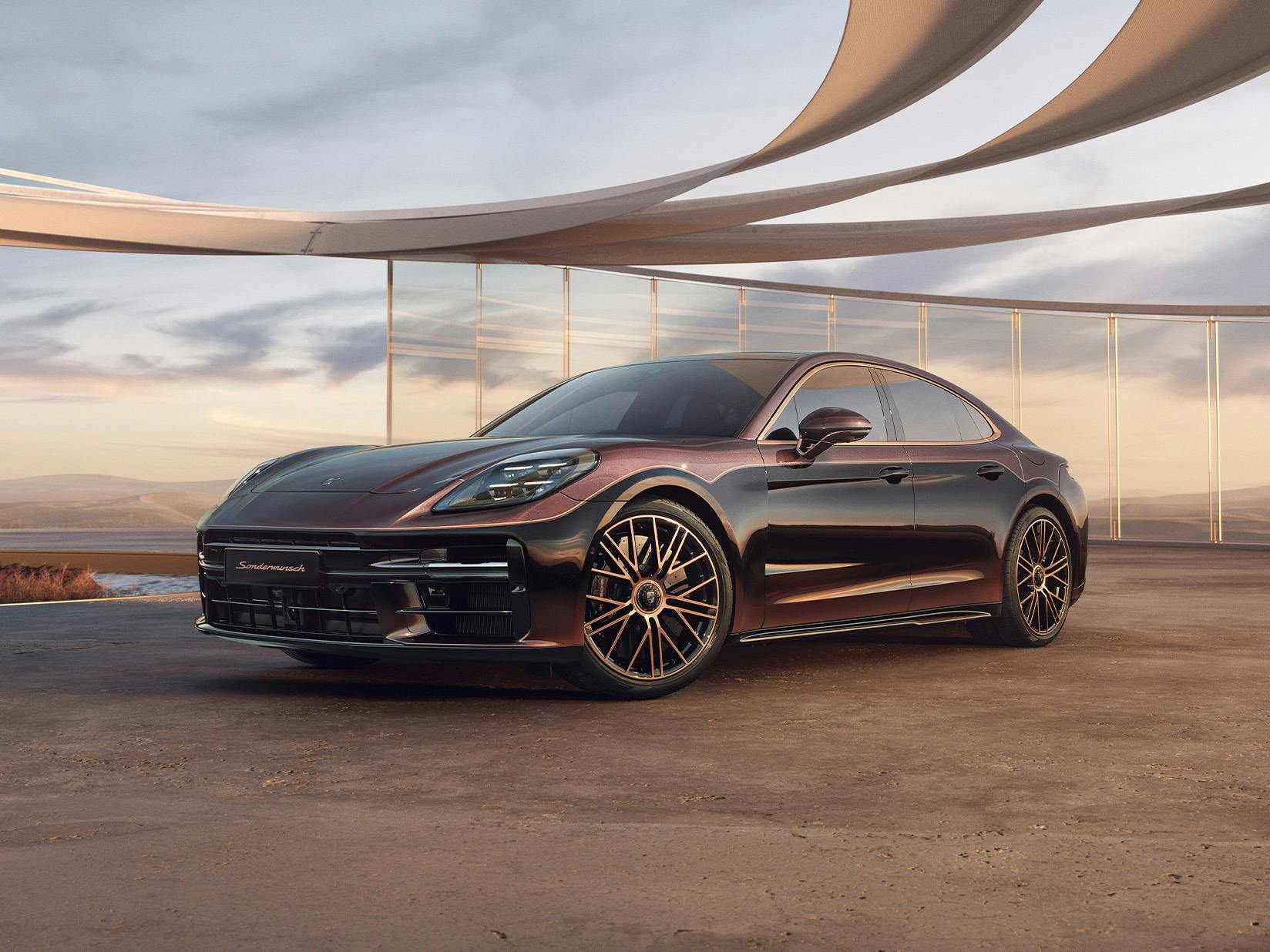 Panamera special request, parked on a modern, open space with futuristic architectural elements in the background.