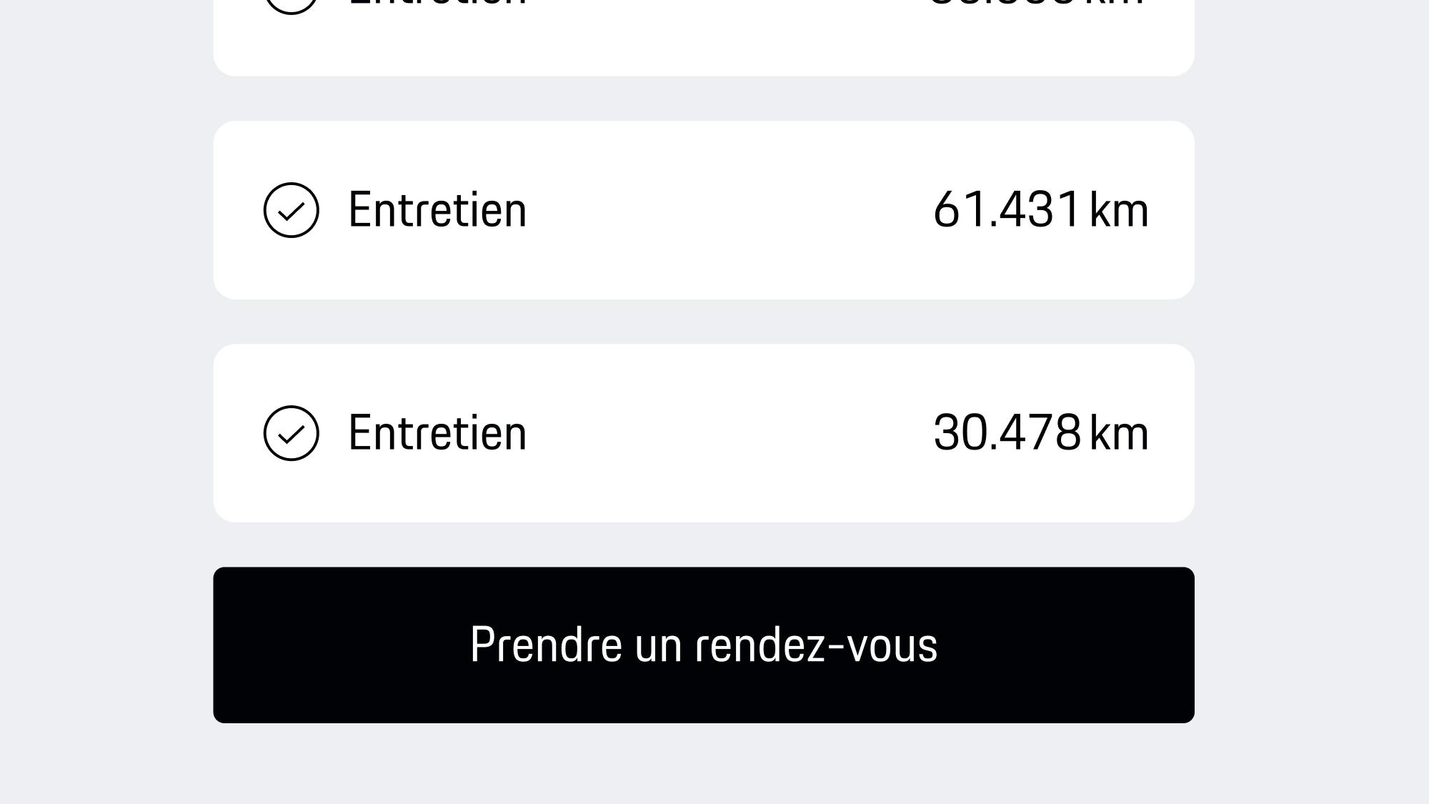 Vue de l'application affichant la liste d'inspection avec les détails du kilométrage et le bouton noir « Prendre rendez-vous » pour planifier l'entretien.