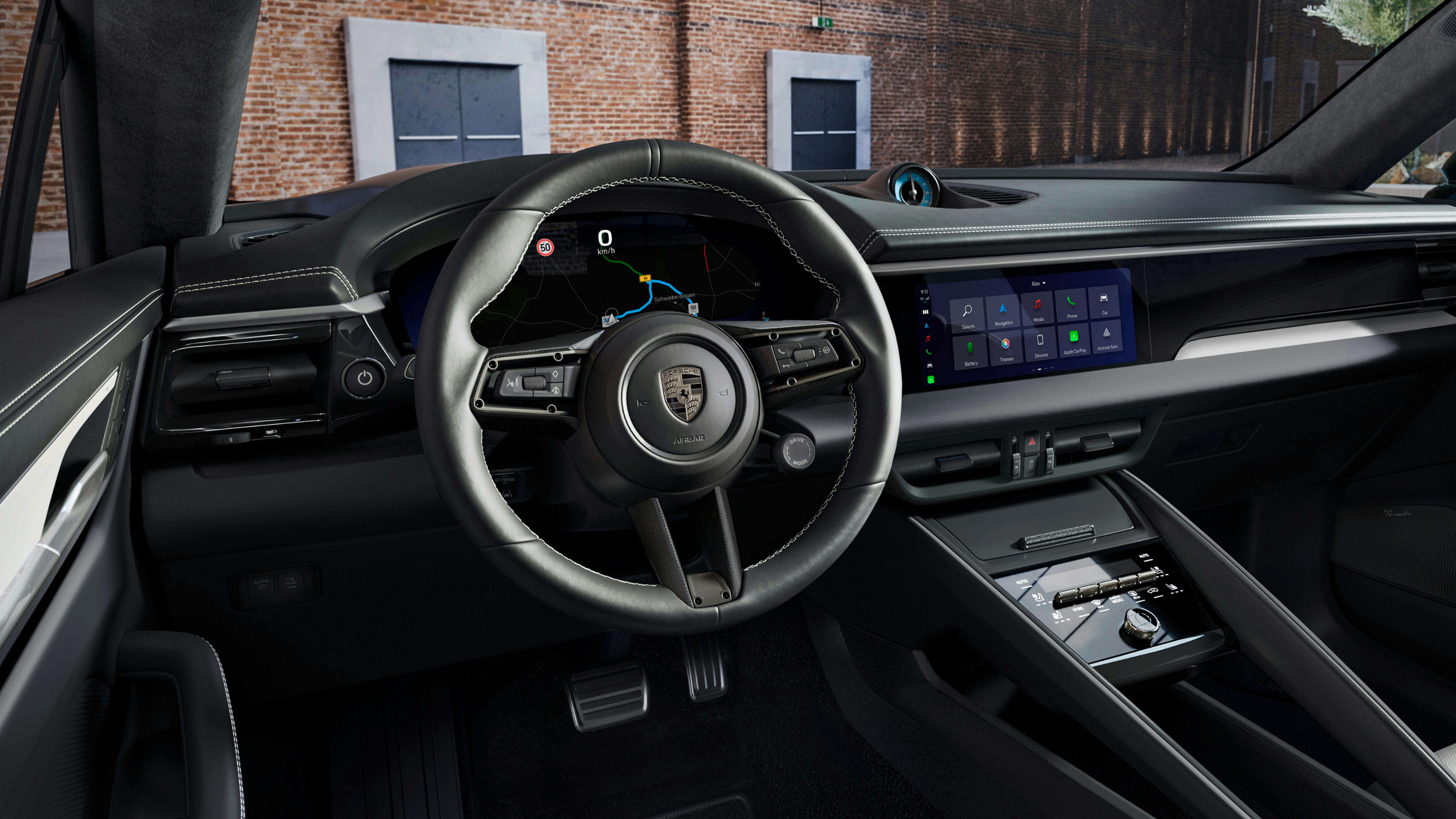 Vue sur le cockpit du Macan Turbo Porsche Exclusive Manufaktur avec Pack Sport Chrono en Bleu Arctique.