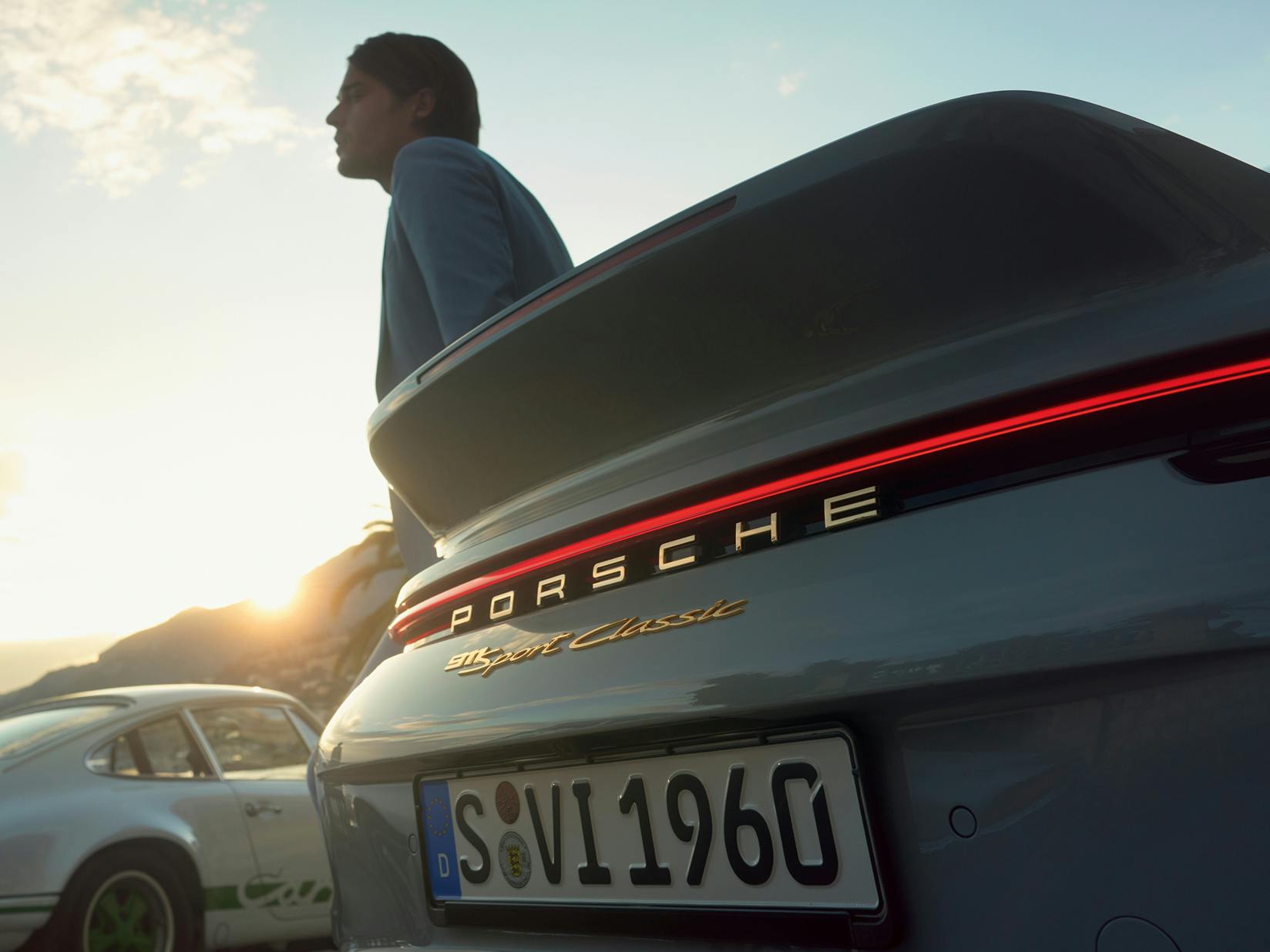 A detailed view of the gold-colored lettering on the rear of the Porsche 911 Sport Classic.