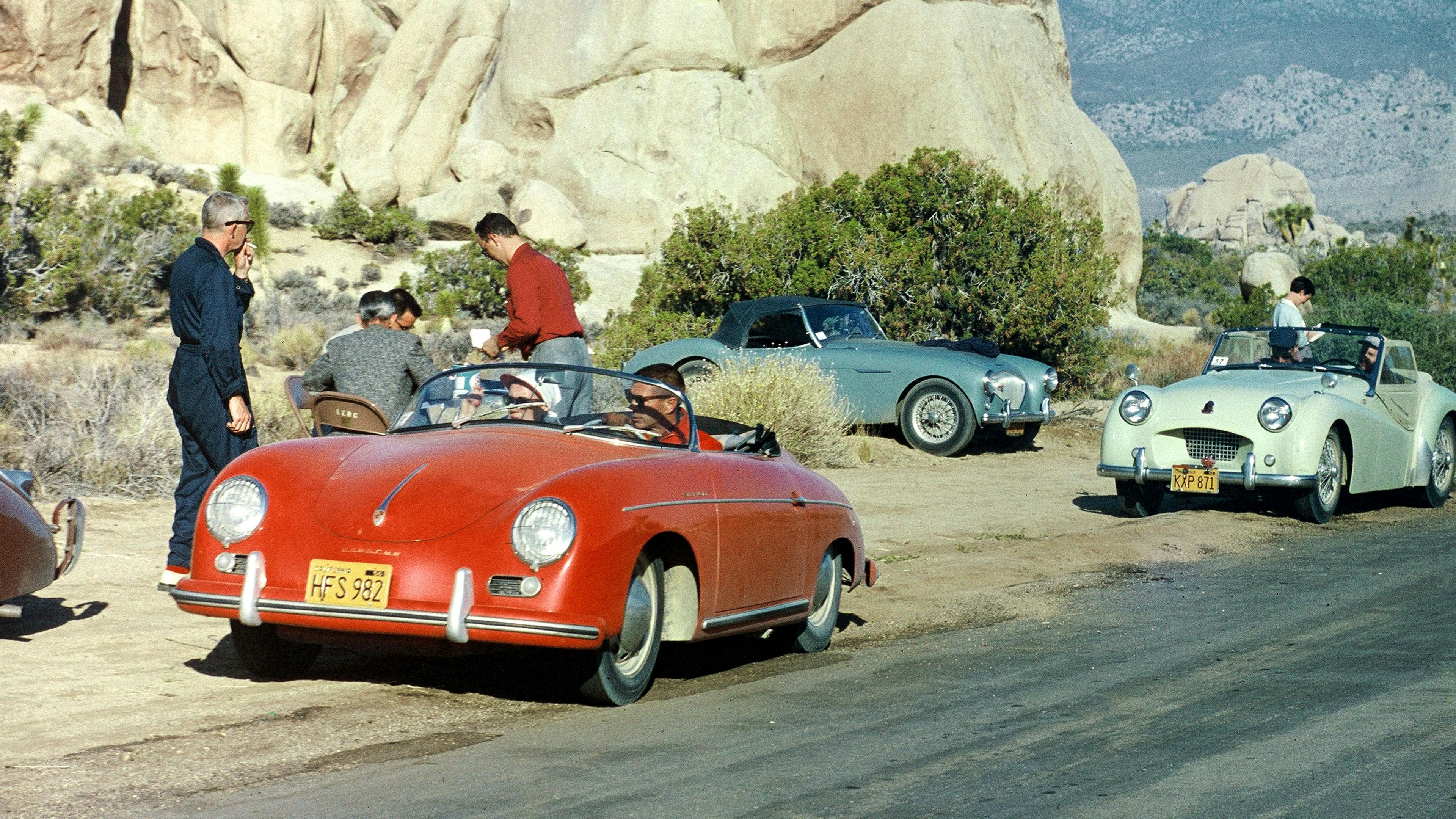 Photo of various Porsche 356 1500 Super Speedsters in  mountainous countryside.