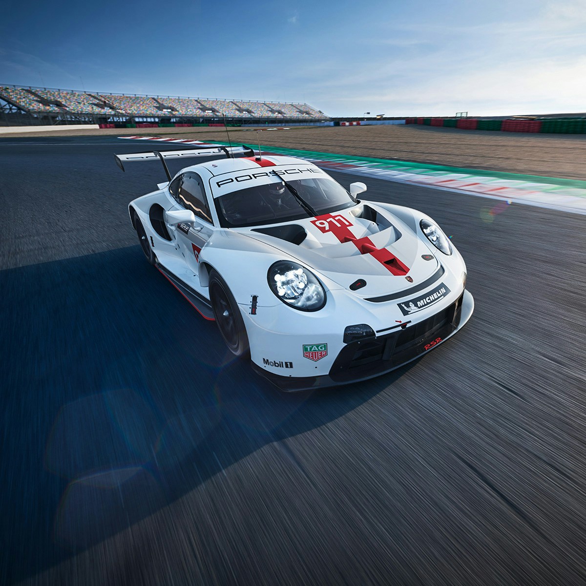 A Porsche race car on a track.