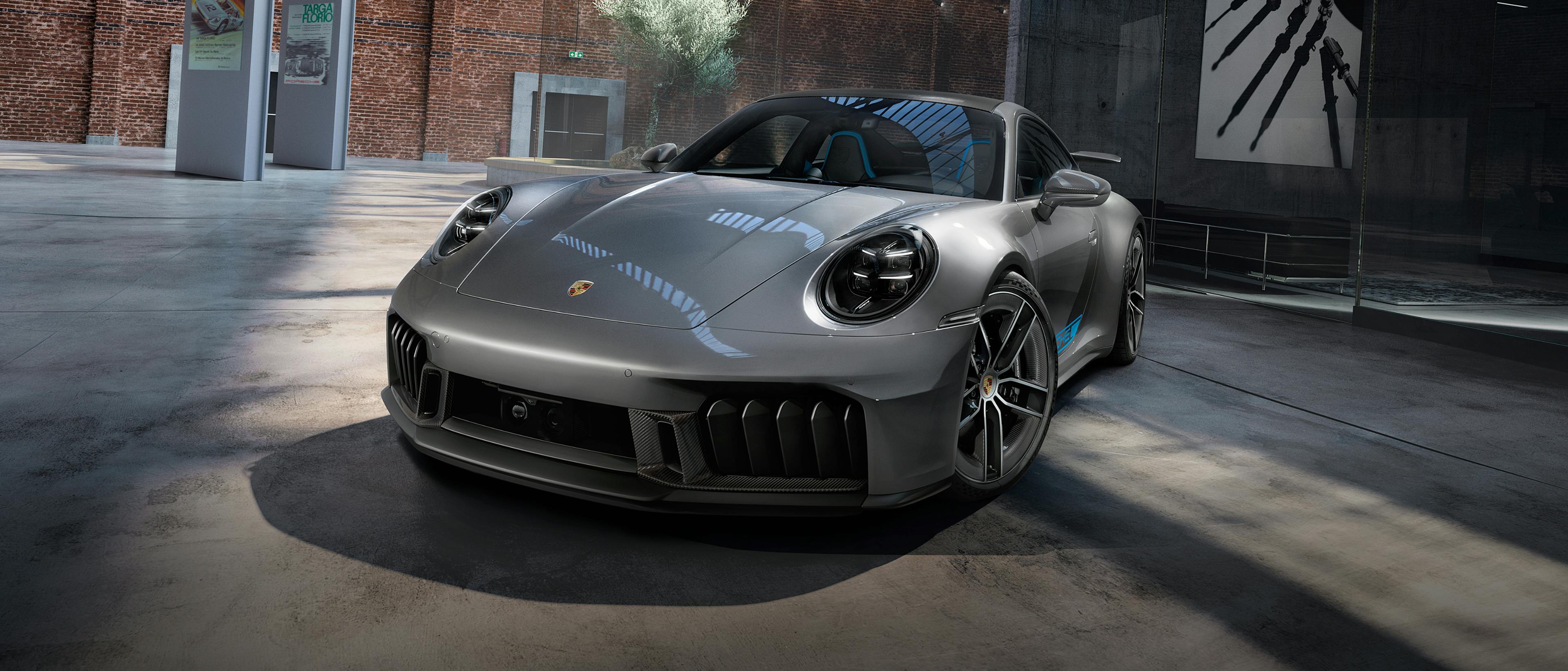 Porsche Exclusive Manufaktur 911 Carrera GTS in a warehouse. Front view.