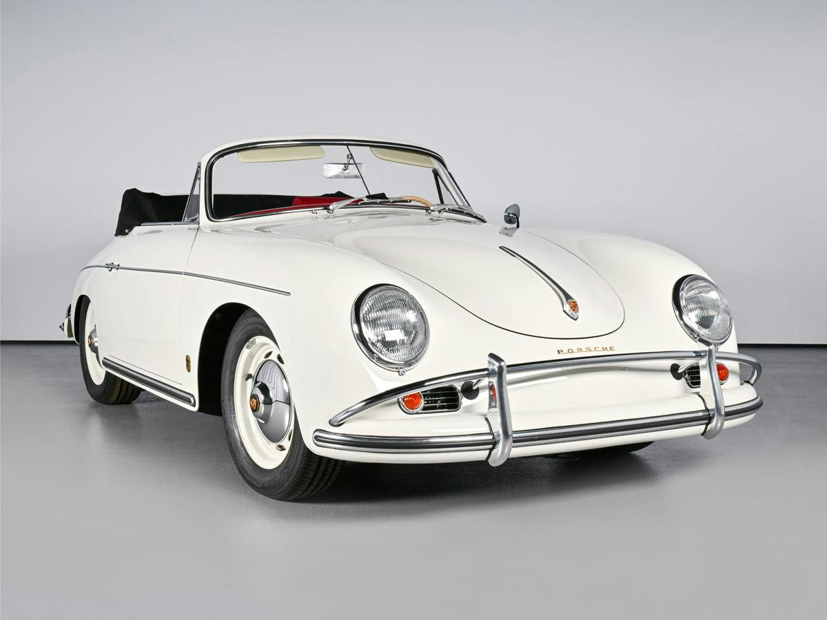 Front three-quarter studio view of a Porsche 356 A 1600 Cabriolet in Ivory.​