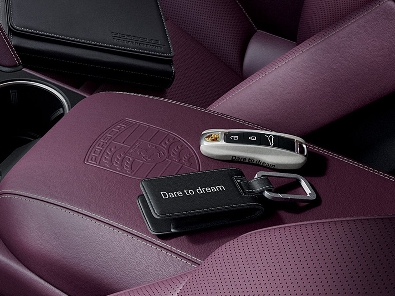 Detailed view of the vehicle key for the Cayenne S with Black leather key case.