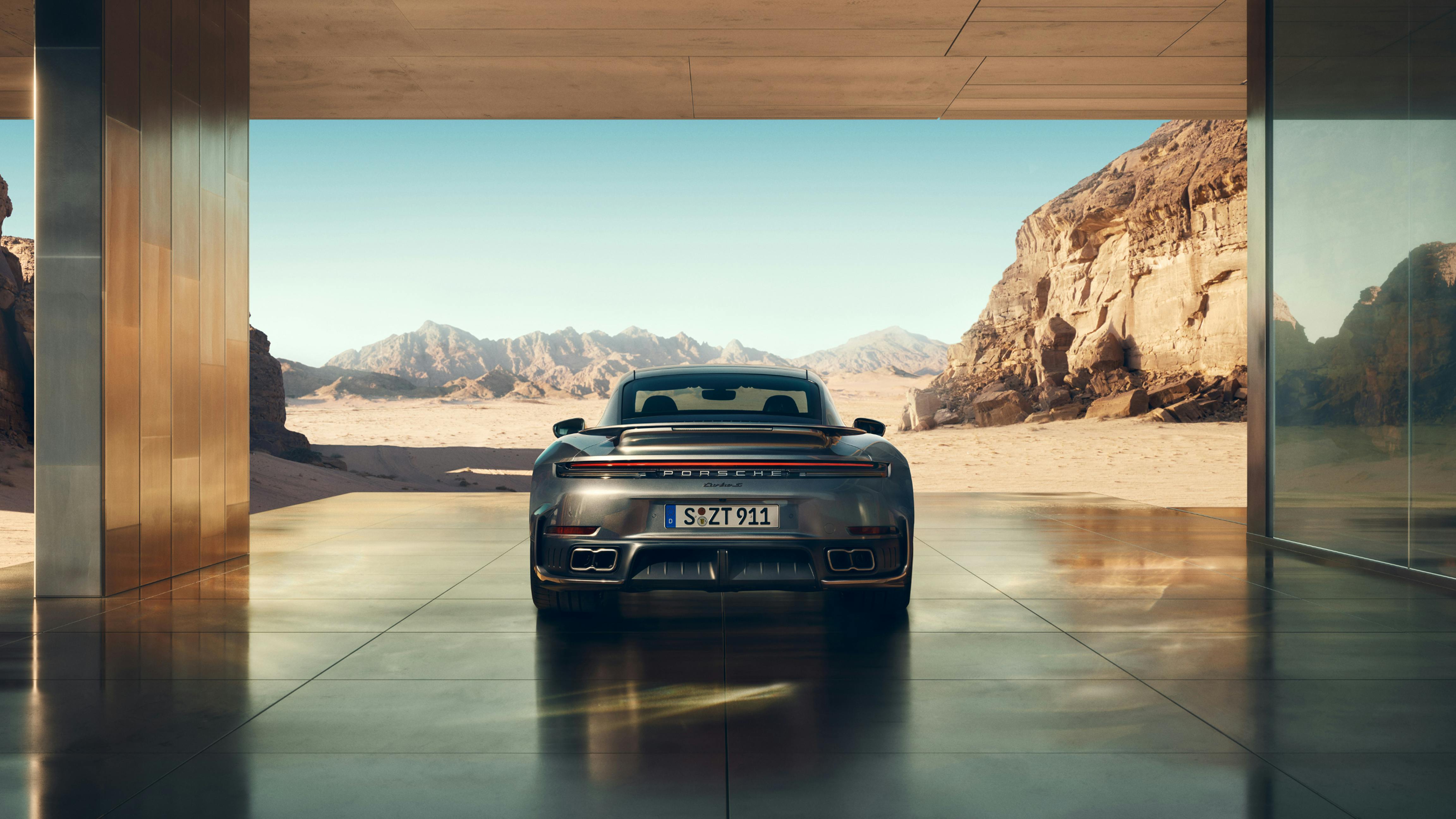 Rear view of the Porsche 911 Turbo S in Vanadium Grey Metallic.