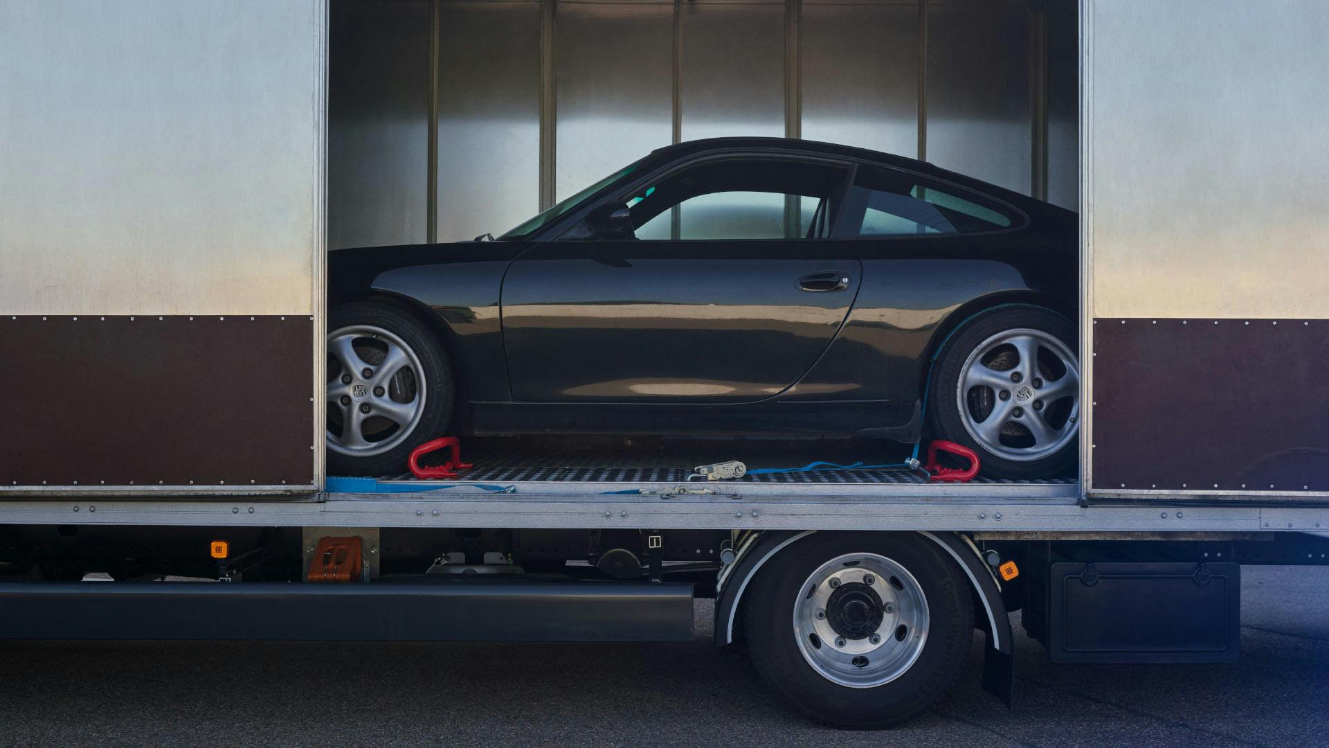 Porsche being transported