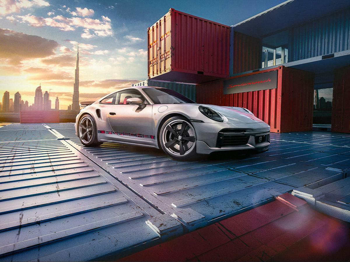 A 911 First Turbo Remastered coloured in GT-Silver in a container park in Dubai.