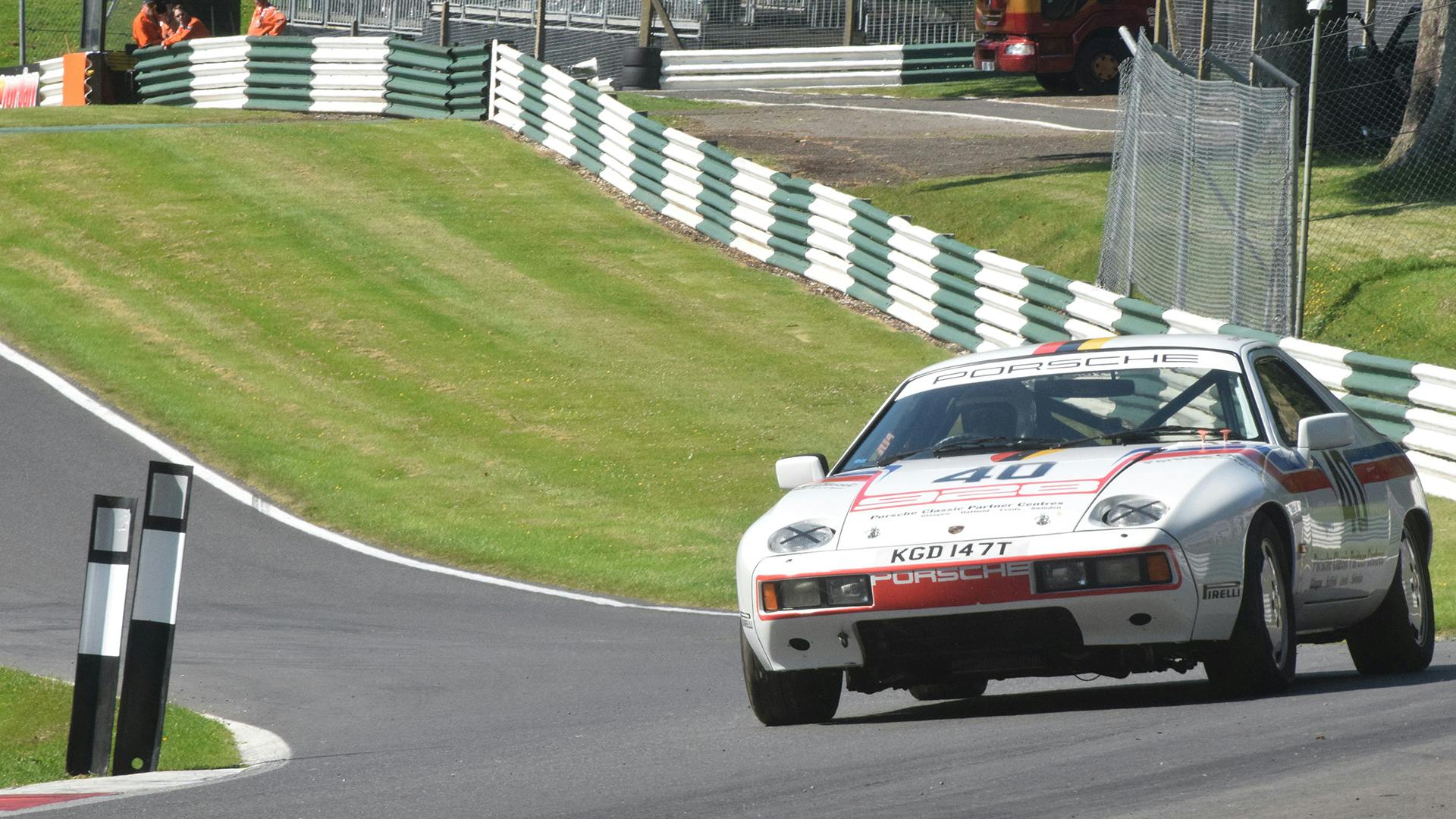The Porsche 928 racing along the race track.