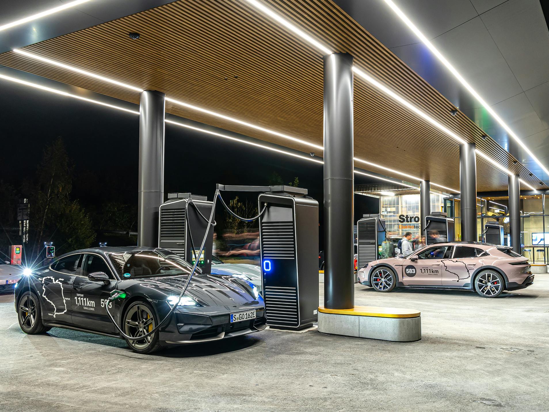 Two Porsche Taycan models charging.