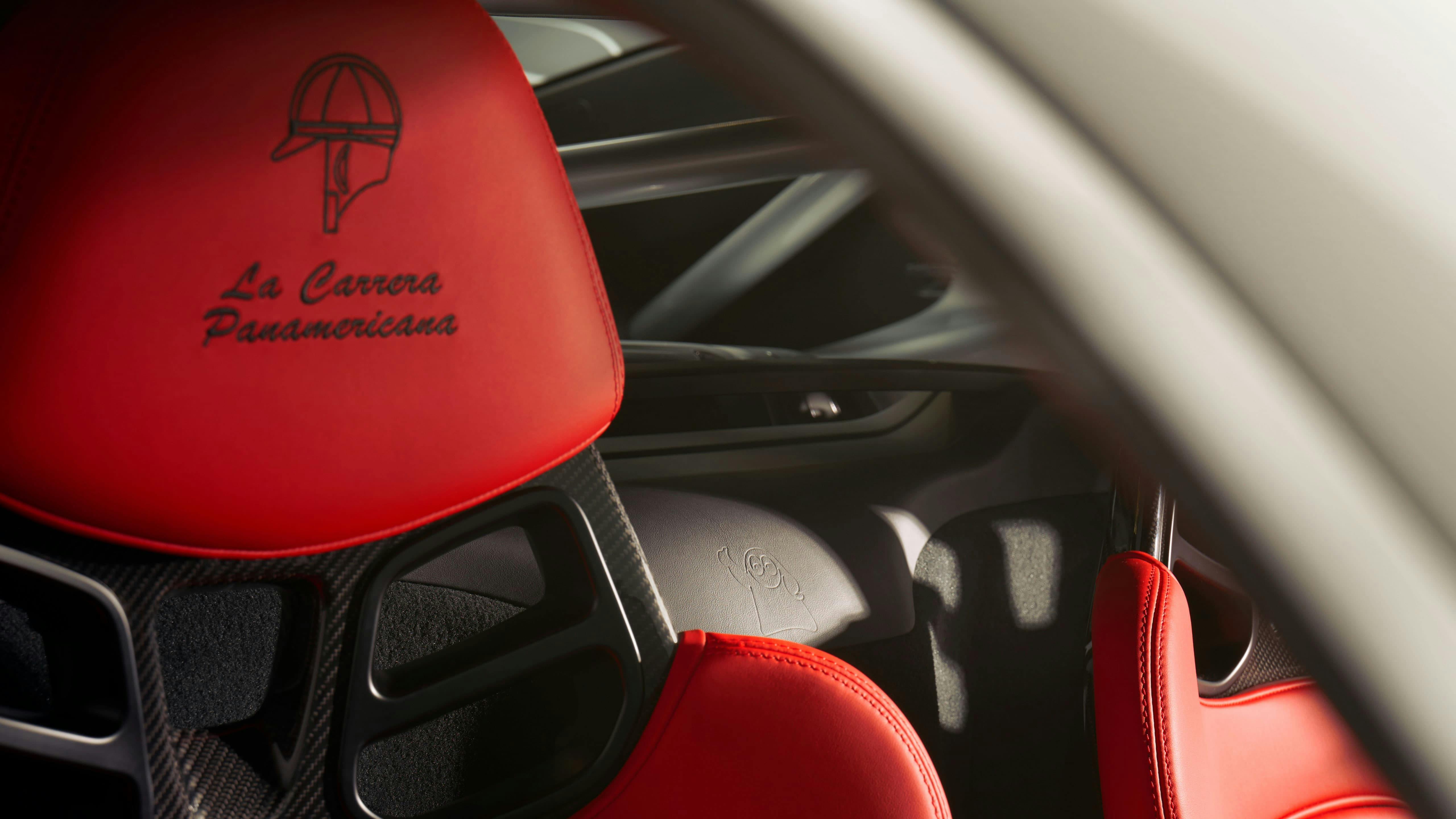 Above the headrests, the embroidered logo of the legendary La Carrera Panamericana.