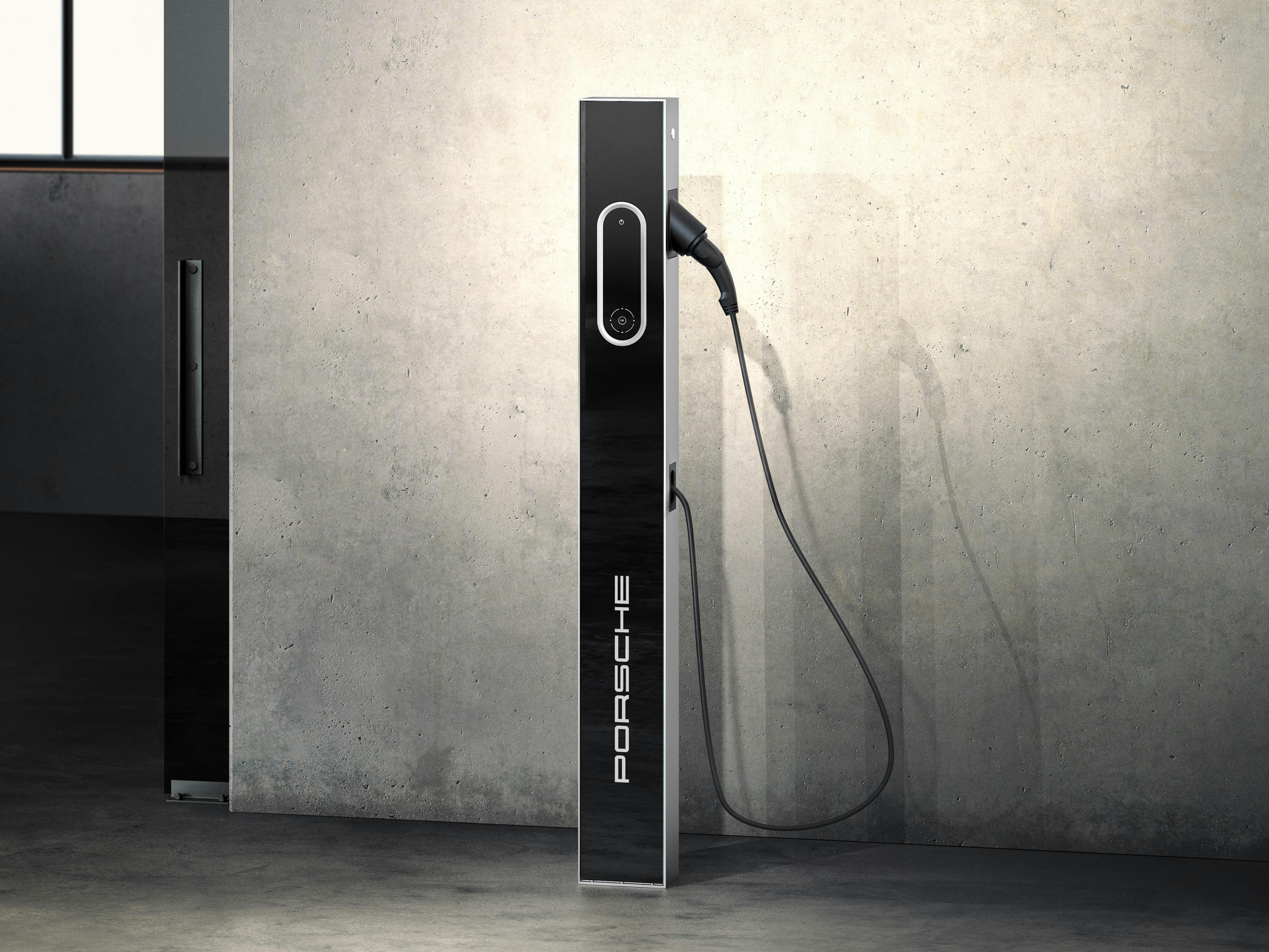 Porsche Compact Charging Pedestal against a light grey background.