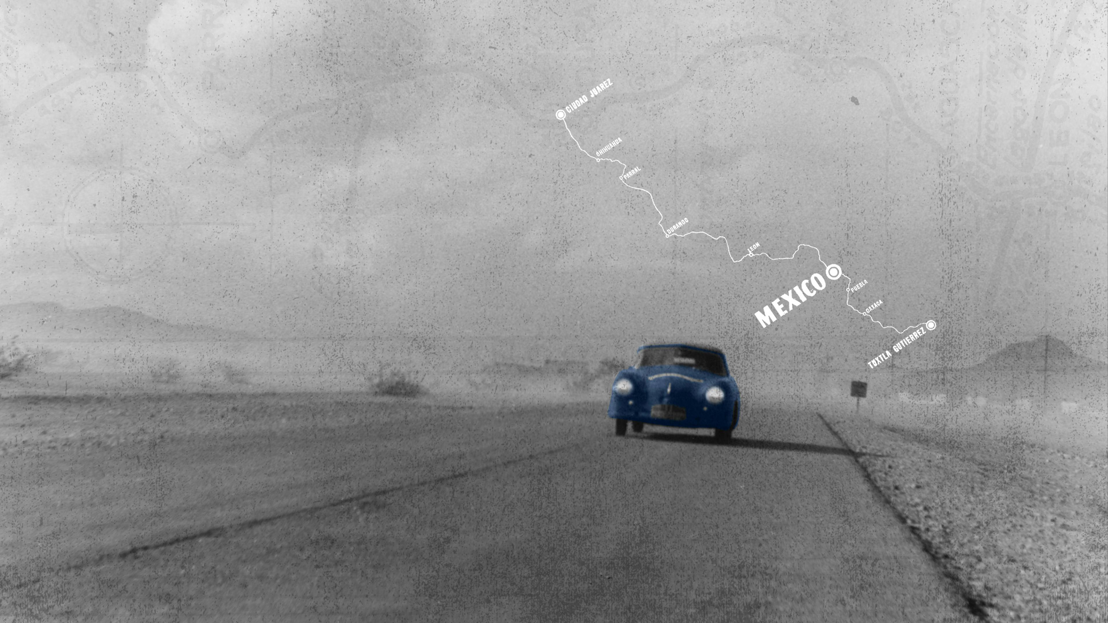 Black and white image from 1952 of a Porsche 356 S Cabriolet running down the road.