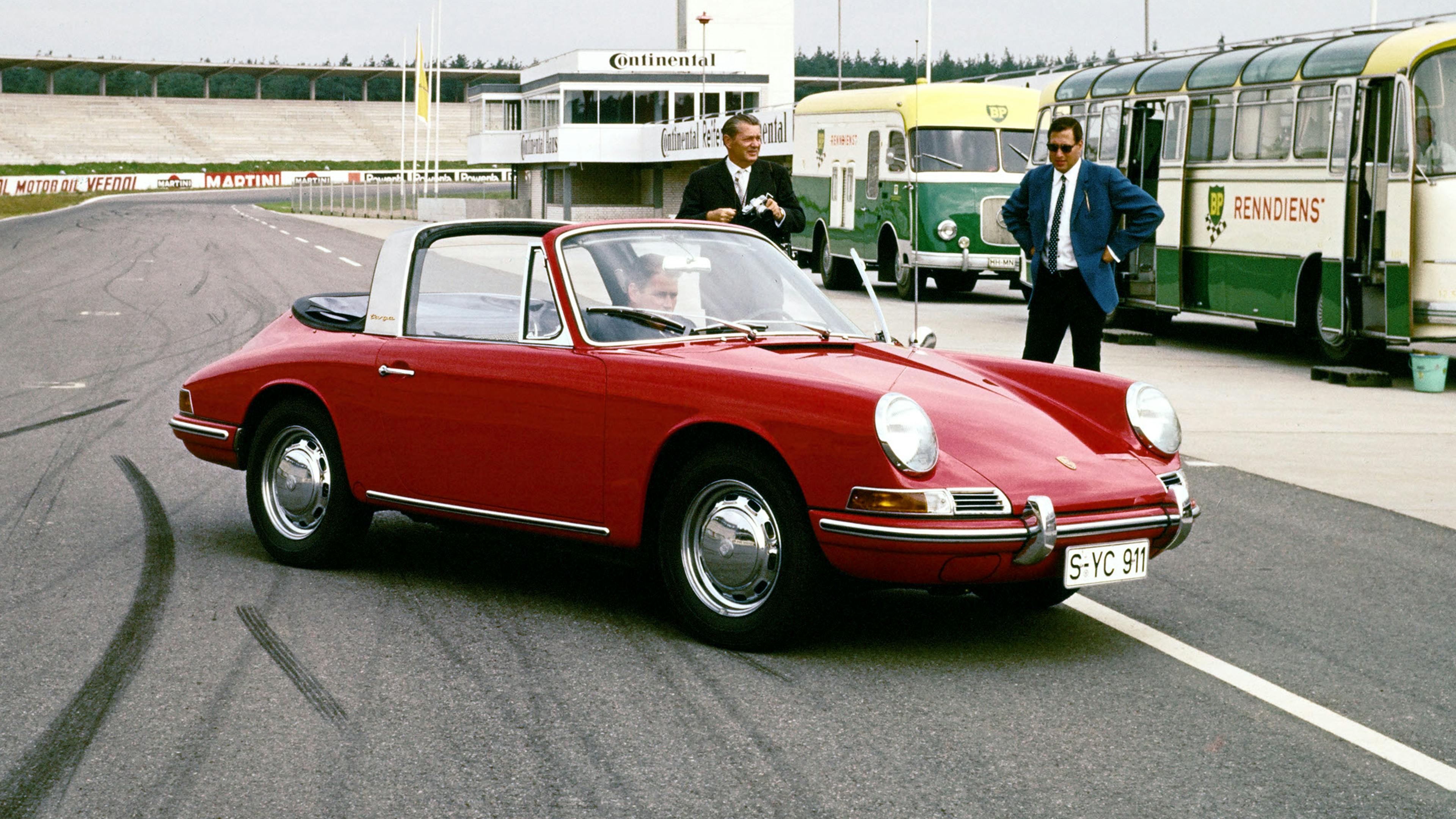 Porsche 911 Targa 2.0 in red standing on a race track