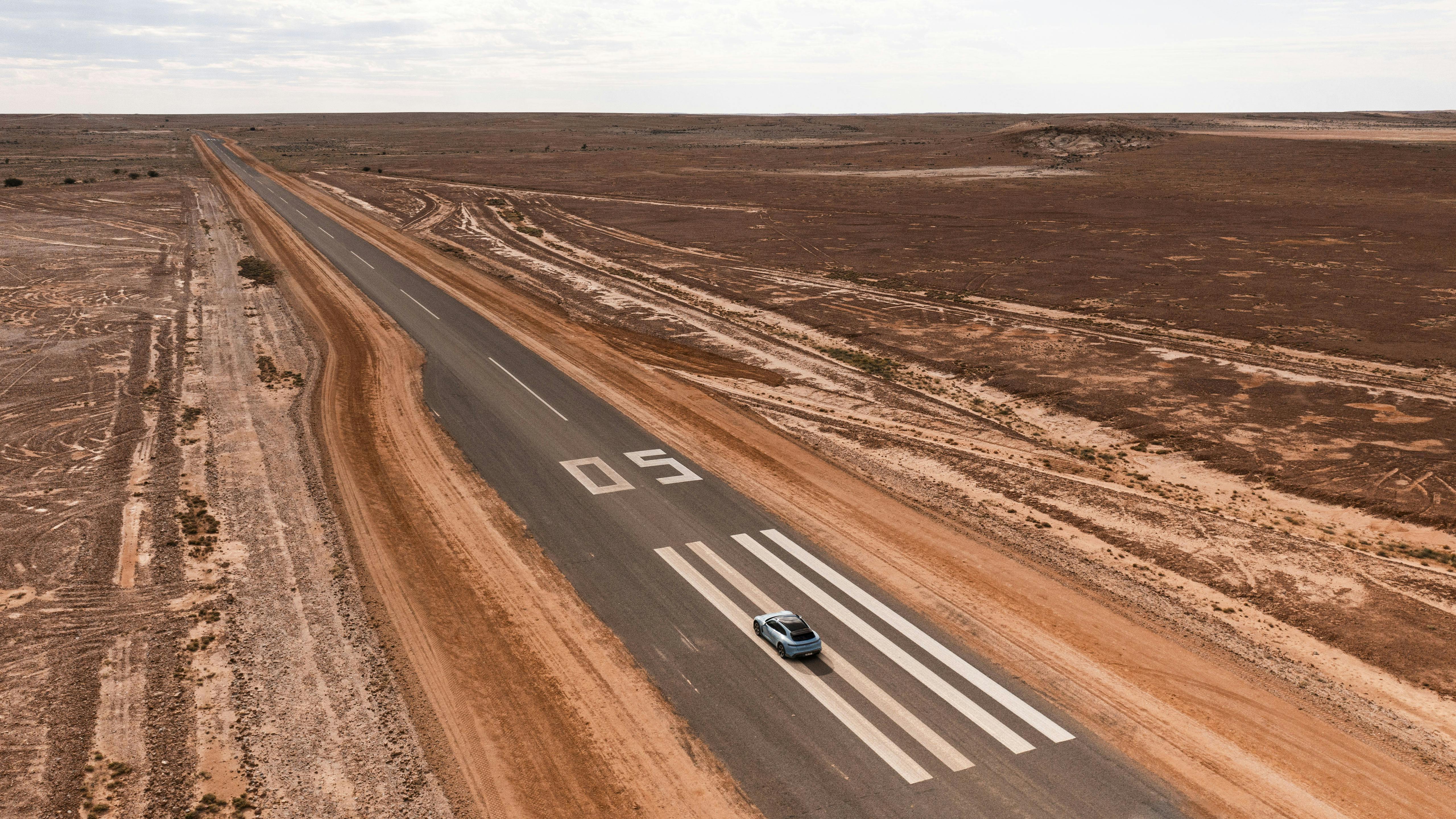 Porsche Taycan Cross Turismo lining up on runway in the Outback