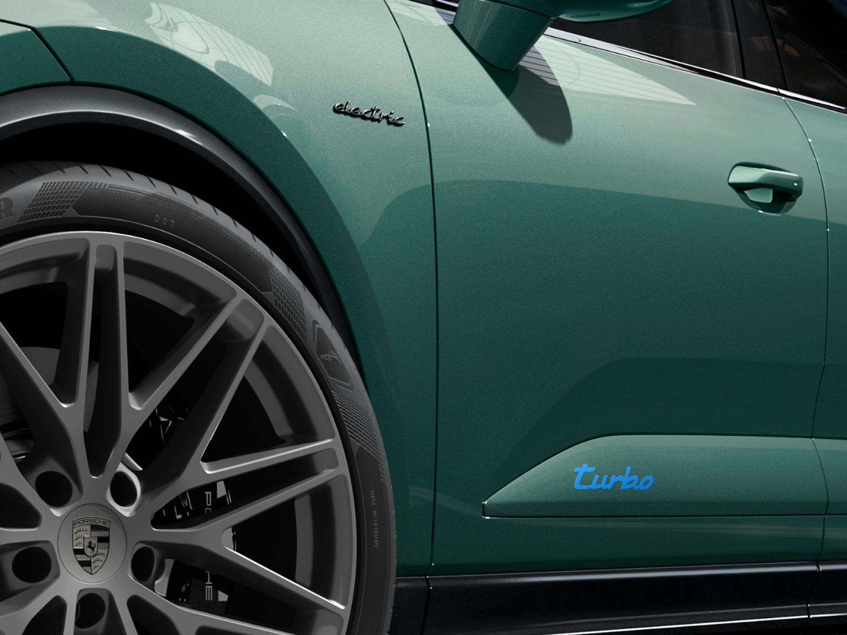 Vue détaillée du lettering « electric » du Macan Turbo Porsche Exclusive Manufaktur.