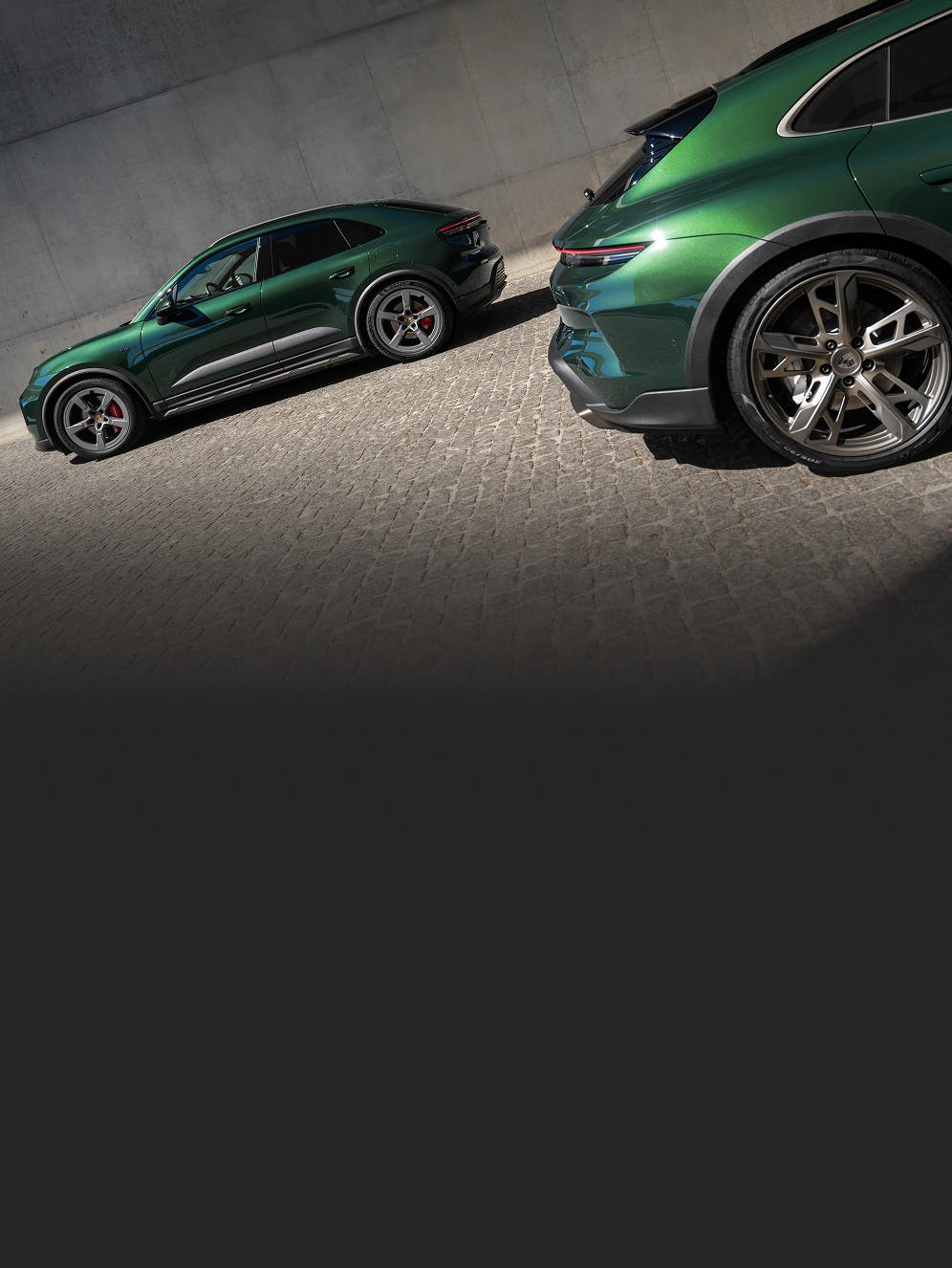 View of the side a Porsche Macan 4S and the rear of a Porsche Taycan Turbo Cross Turismo.