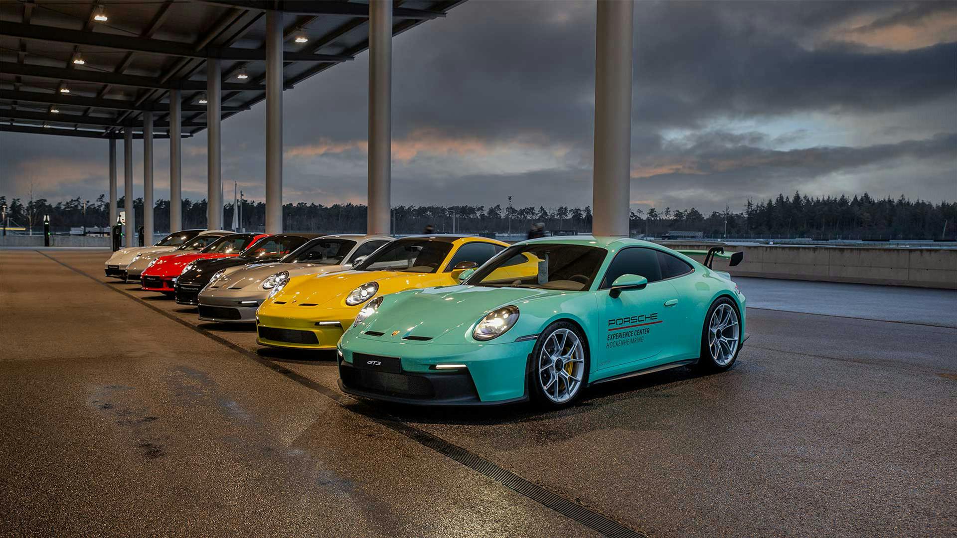 Seven Porsche models are lined up in the Porsche Experience Centre at the Hockenheimring.