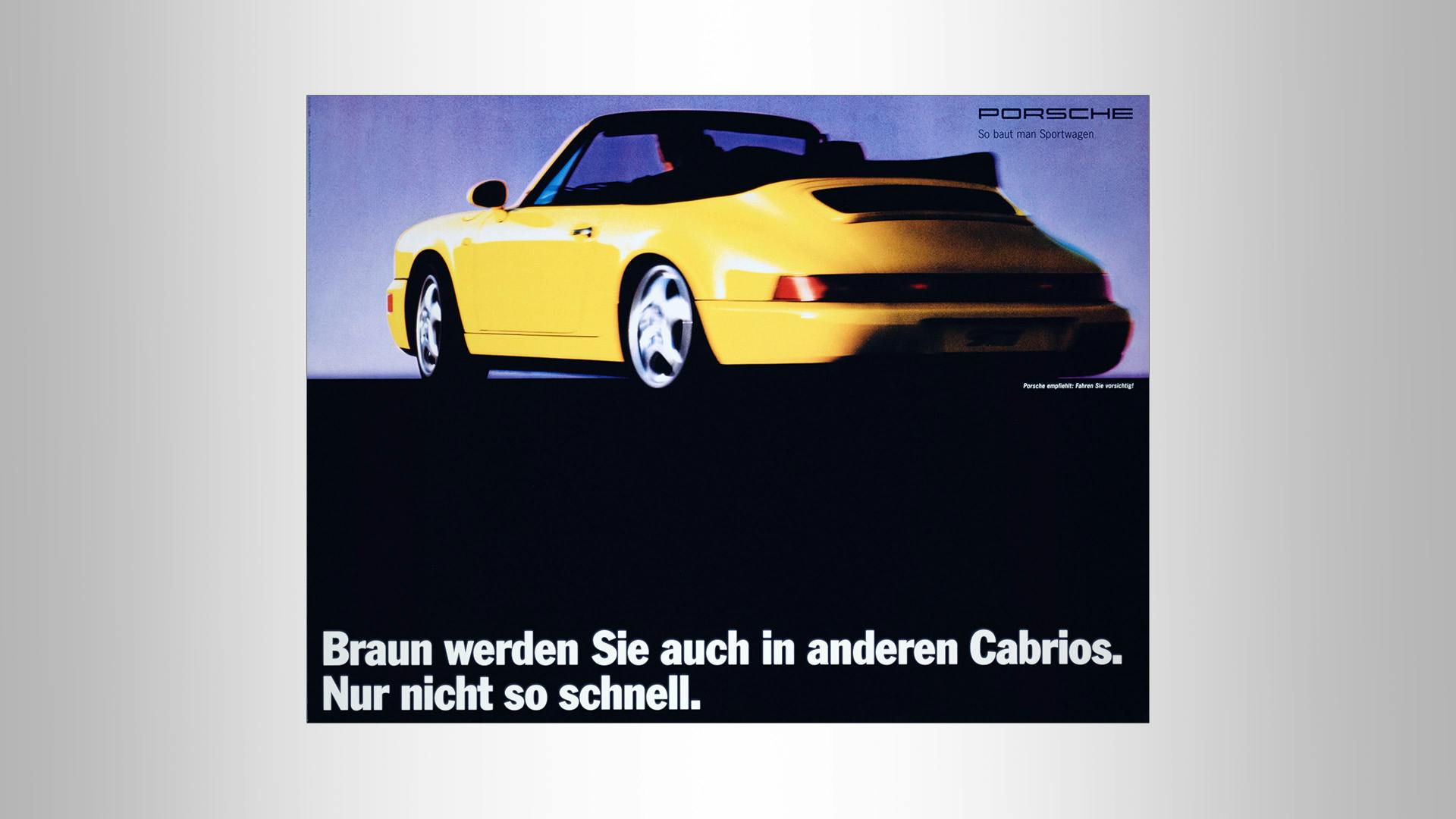Porsche advertising poster with yellow Porsche 964 Cabriolet and the slogan: Braun werden Sie auch in anderen Cabrios. Nur nicht so schnell. In a small font: Porsche empfiehlt: Fahren Sie vorsichtig!