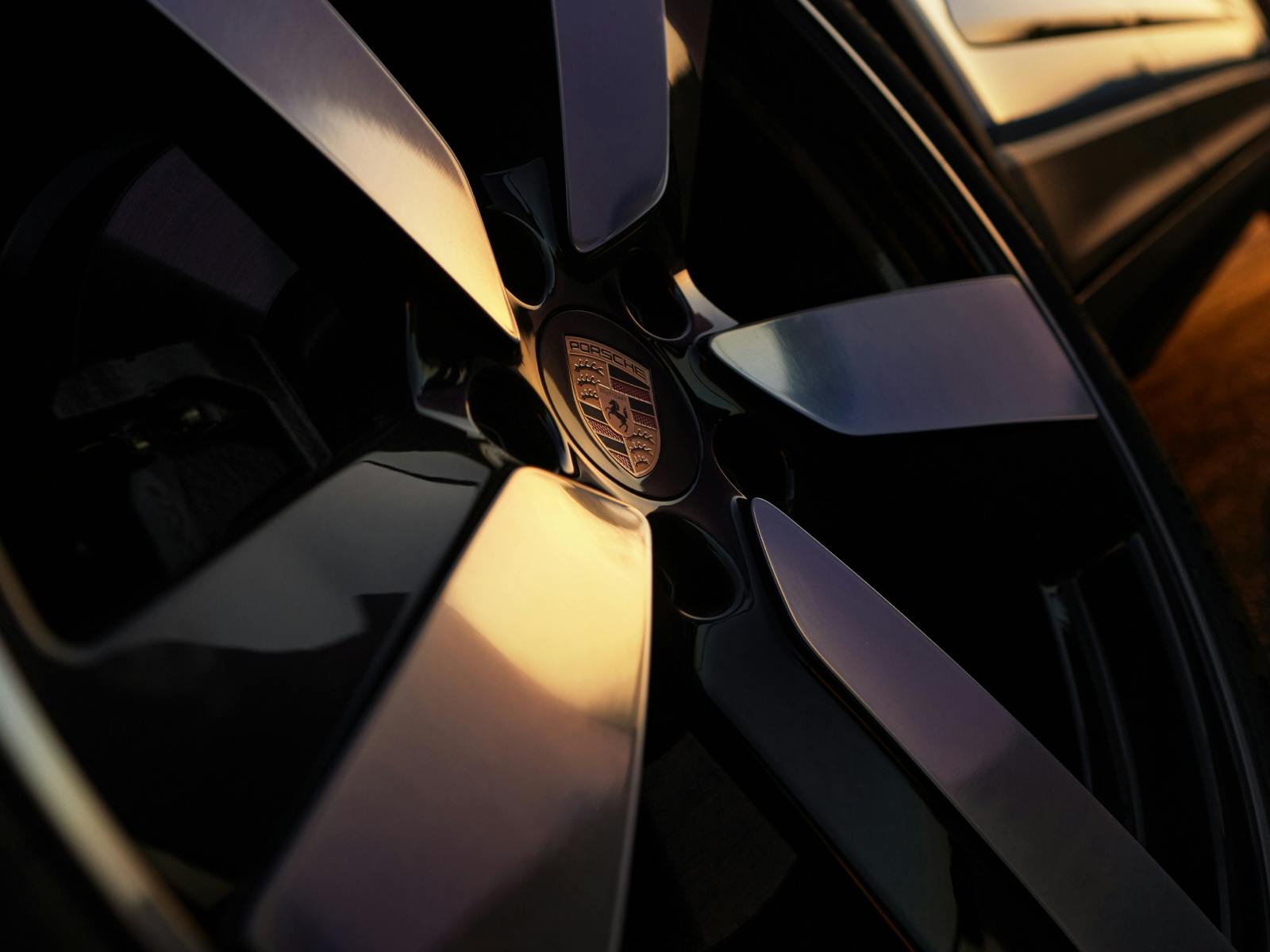 Detailed view of a Porsche aluminium rim.