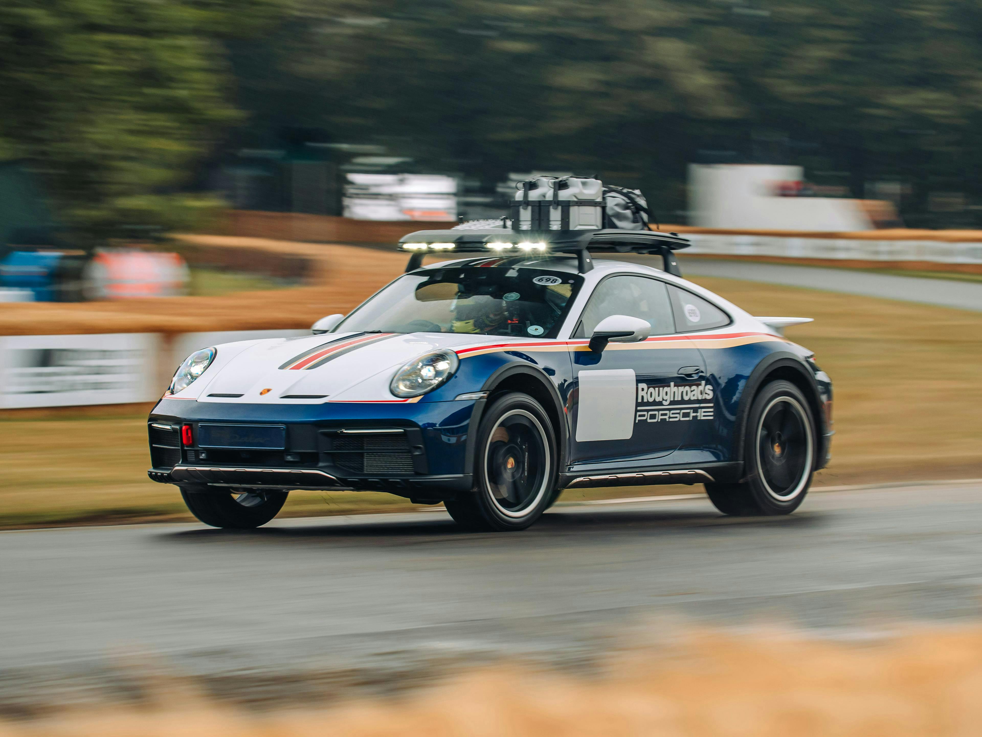 Porsche 911 Dakar with the Rallye Design Package on track at the 2023 Goodwood Festival of Speed.